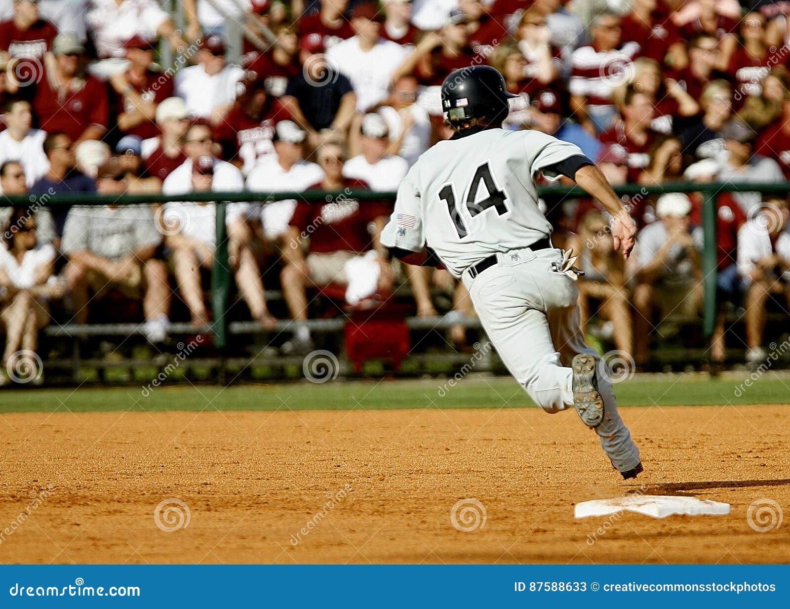 Baseball Player Number 14 Chasing Goal On Baseball Field Picture. Image
