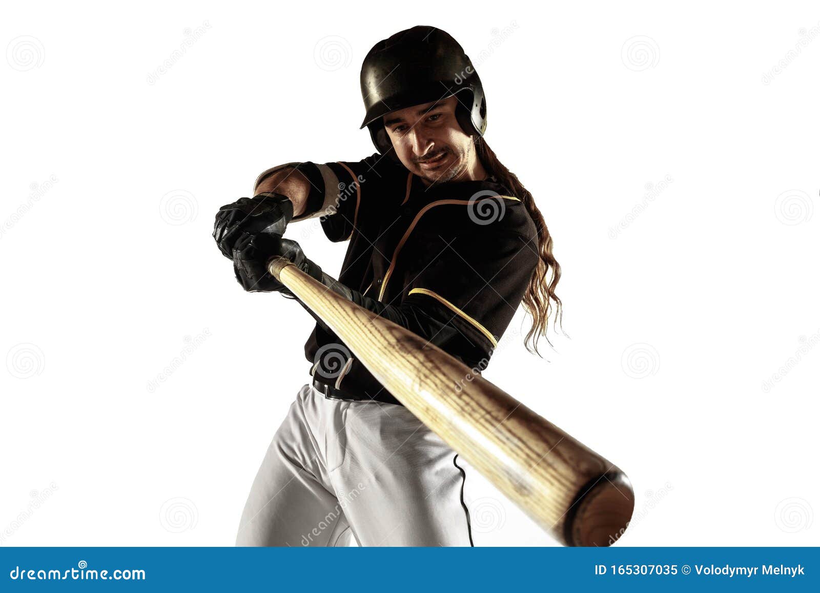 Baseball Player, Pitcher in a Black Uniform Practicing on a White