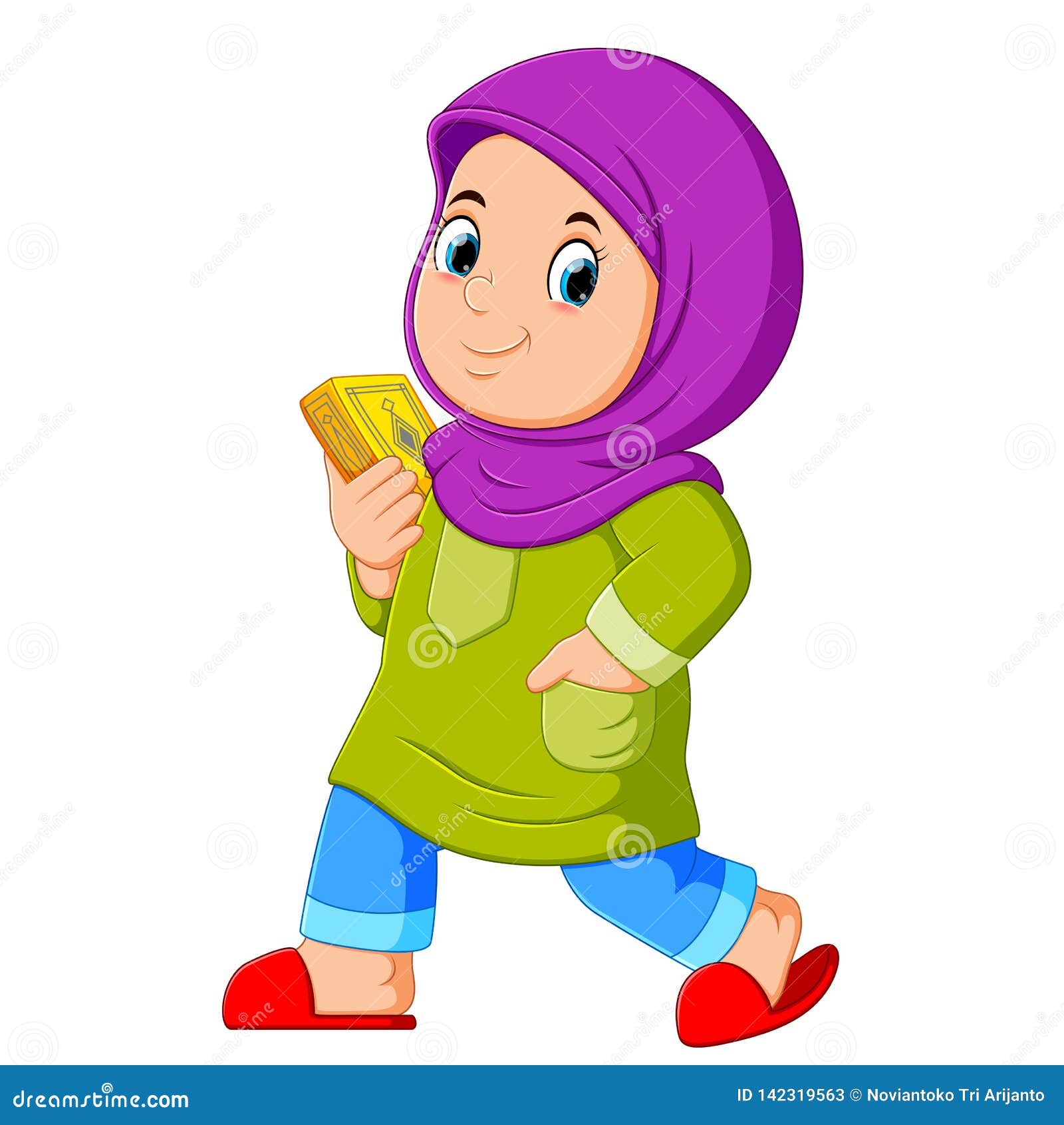 moslem girl walking and carrying holy quran