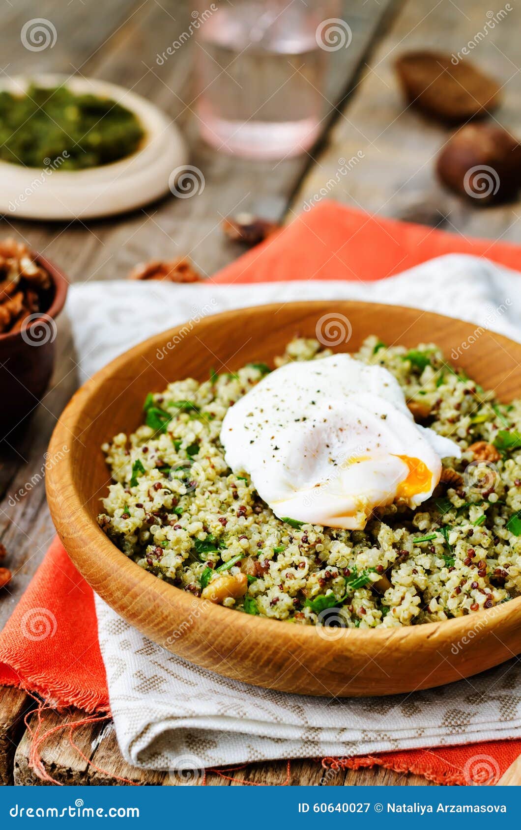 Basil Nuts Pesto Quinoa with Walnuts, Parsley and Poached Egg Stock