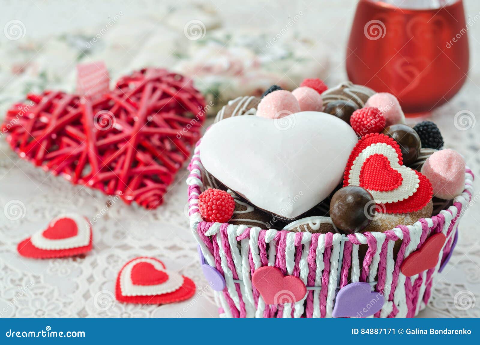 Basket with Chocolates, Cookies and a Decorative Valentines Day Hearts
