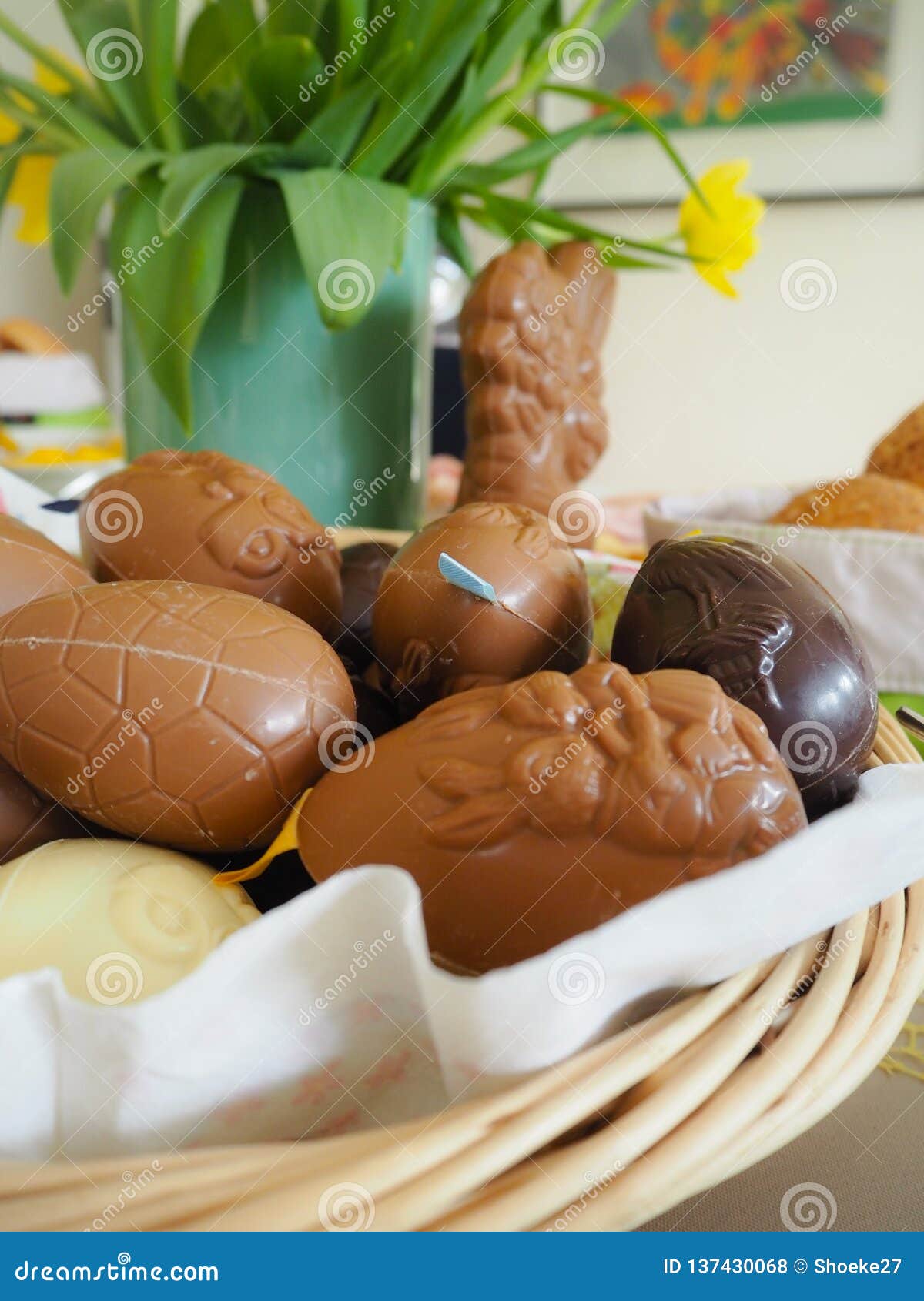 Basket Full with Large Chocolate Easter Eggs for a Festive Easter