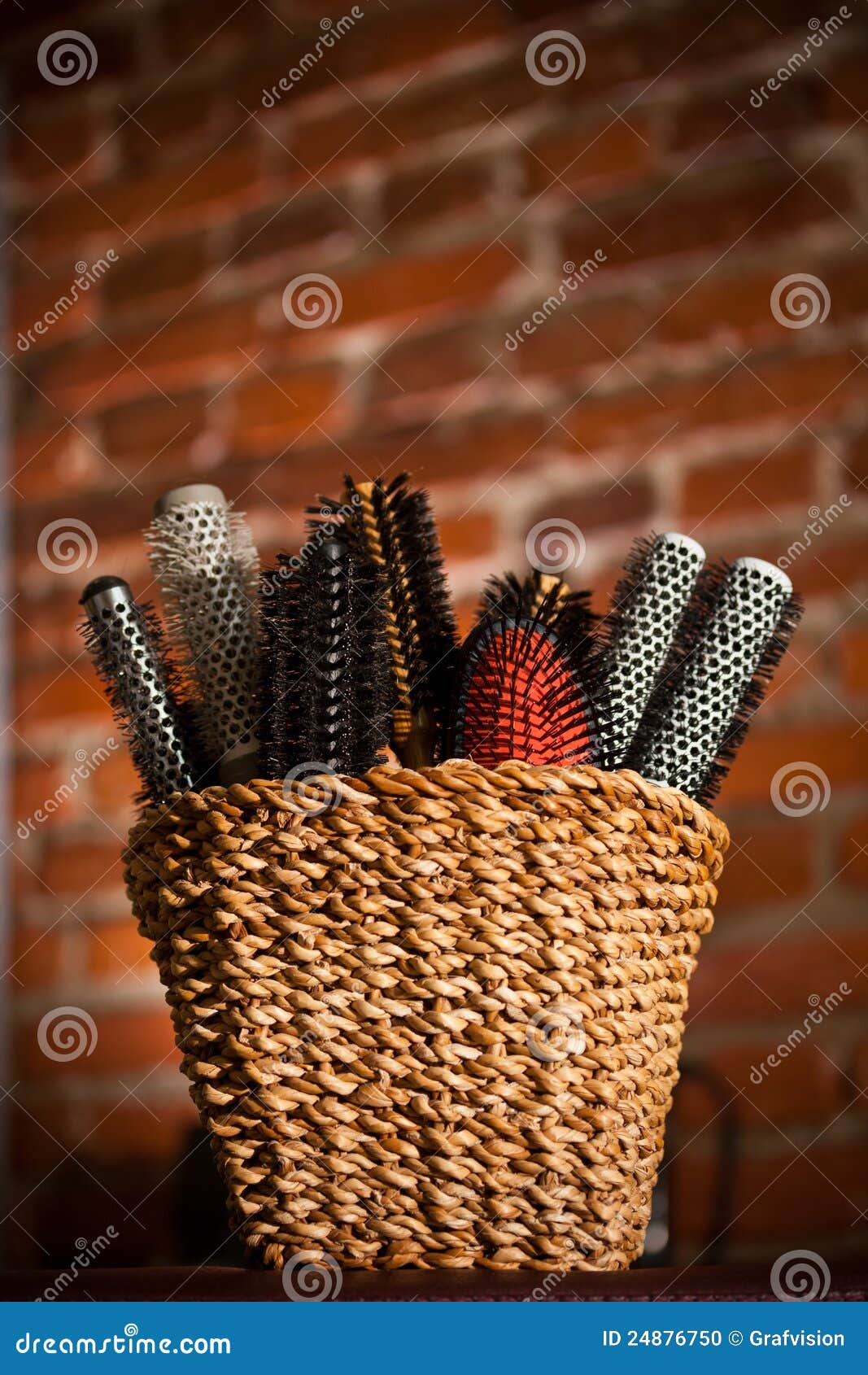 Basket with hair brushes stock photo. Image of round 24876750