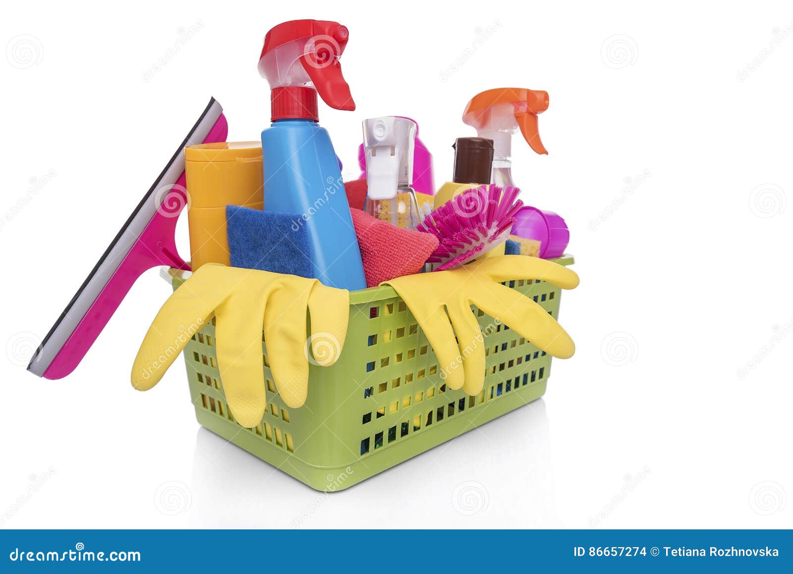 Basket with cleaning products on blue background. Cleaning with