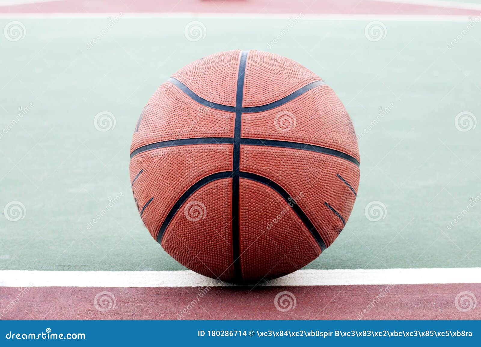 Basketball Ball with Basketball on Court. Stock Photo Image of