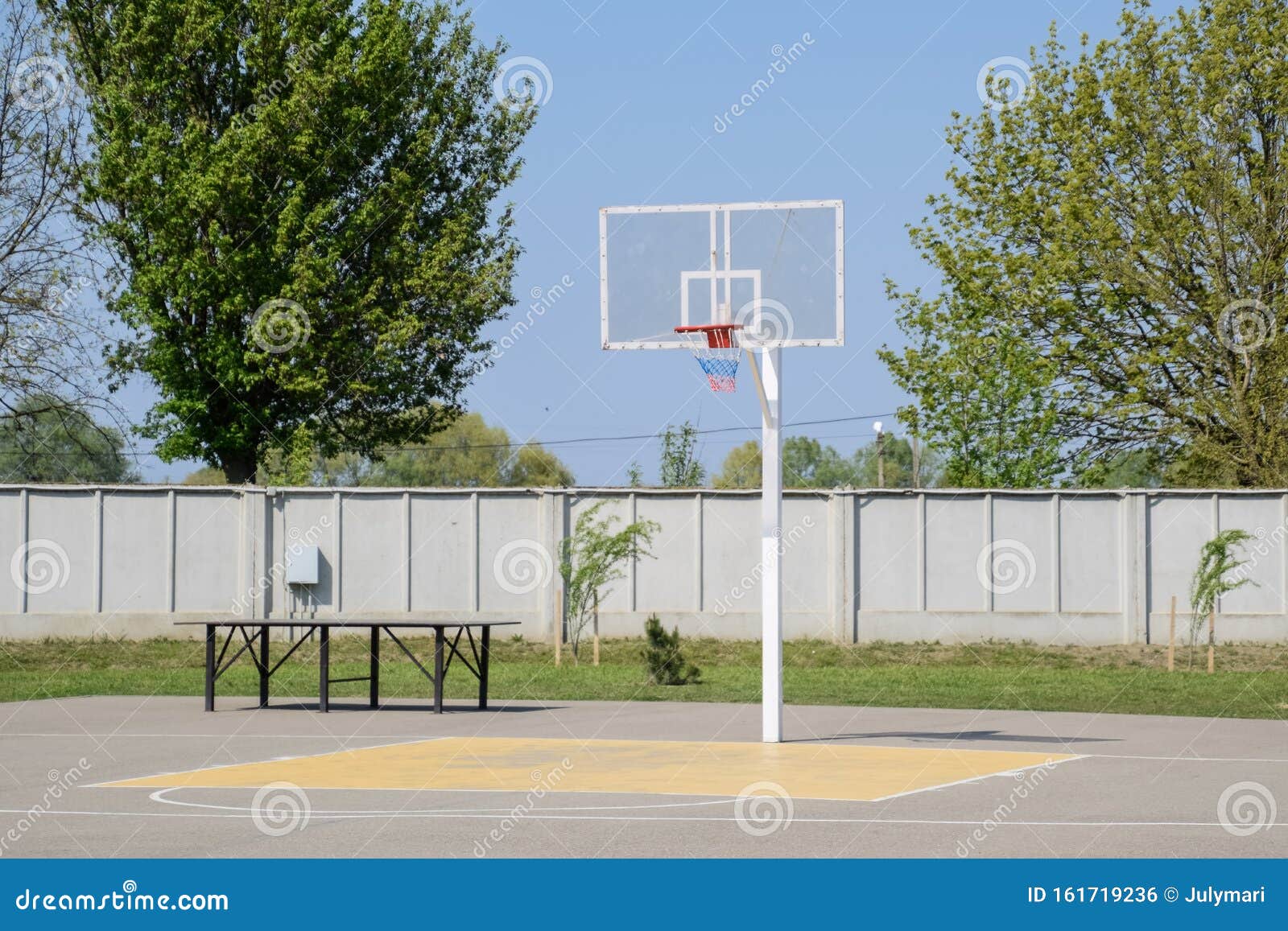 Basketball Court and Backboard with Hoop. Yard Basketball Stock Photo