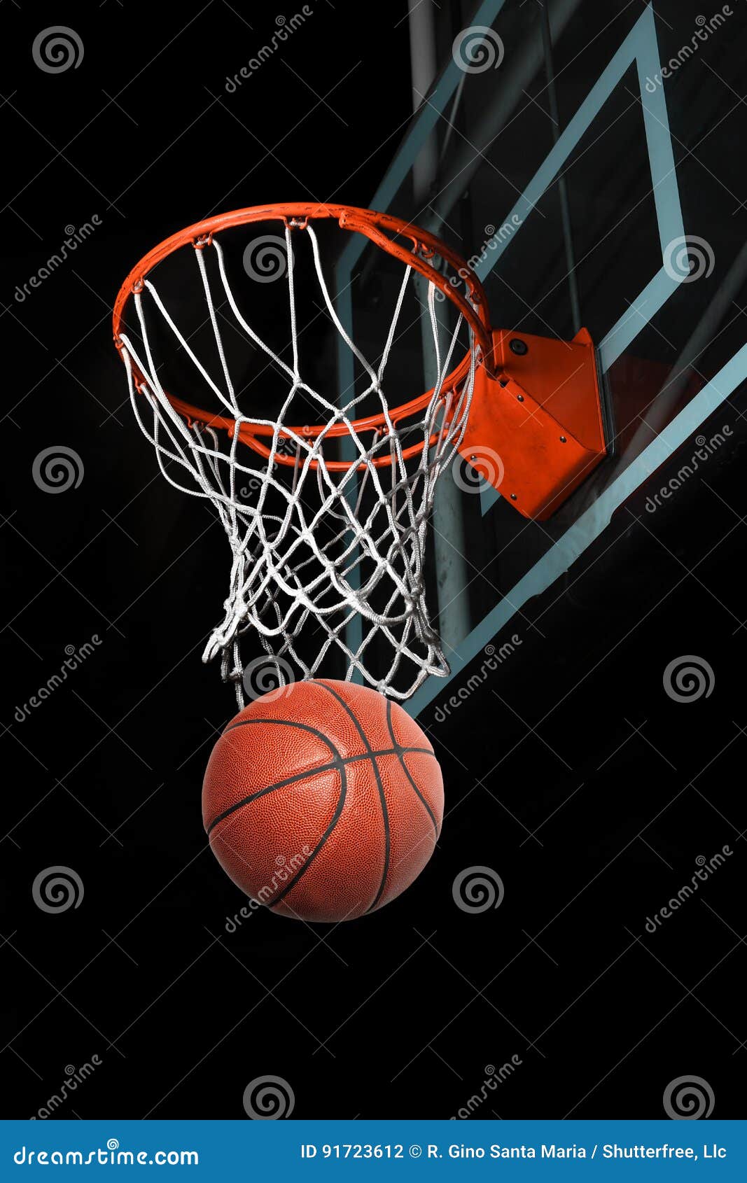 Basketball Going through Hoop Stock Photo Image of swish, bucket