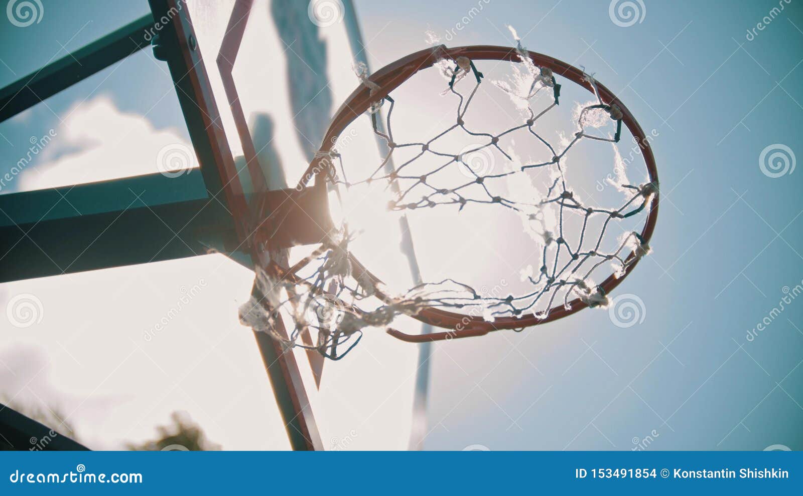 A Basketball Hoop. the Net Fluttering on the Wind Stock Photo Image