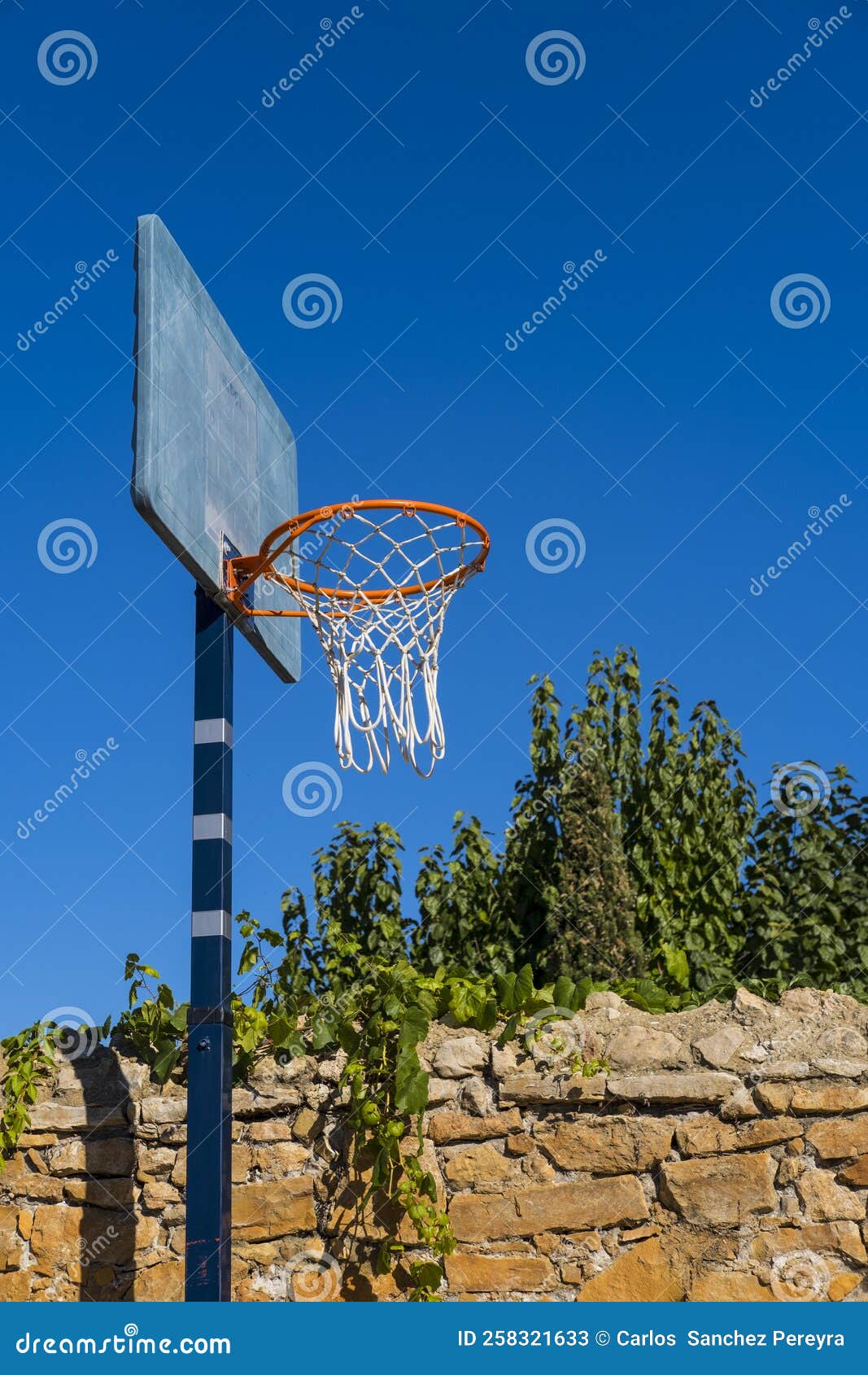 Basketball hoop in a park stock image. Image of play 258321633