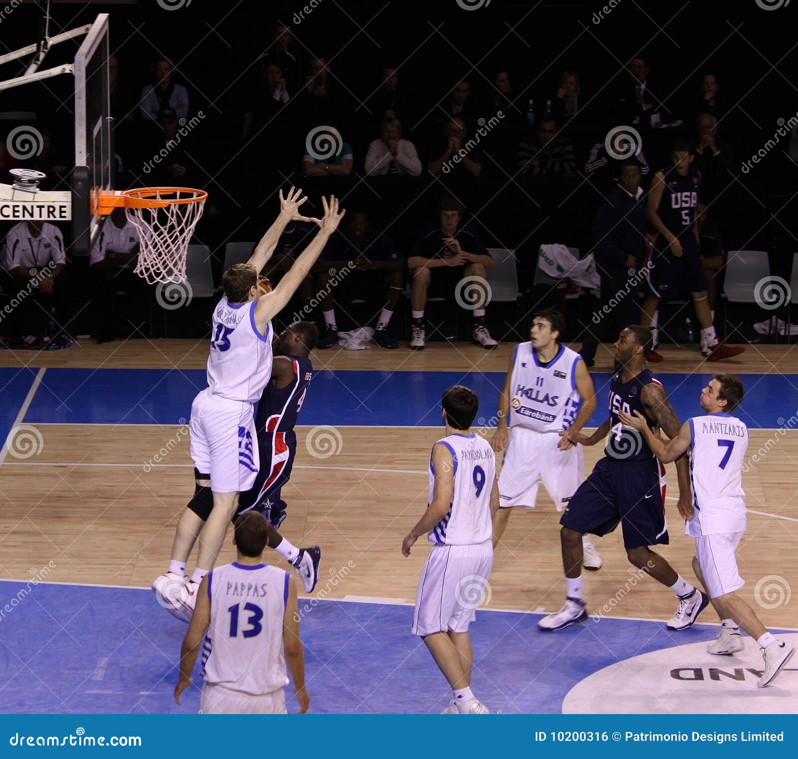 Basketball player blocking editorial photo. Image of basketball - 10200316