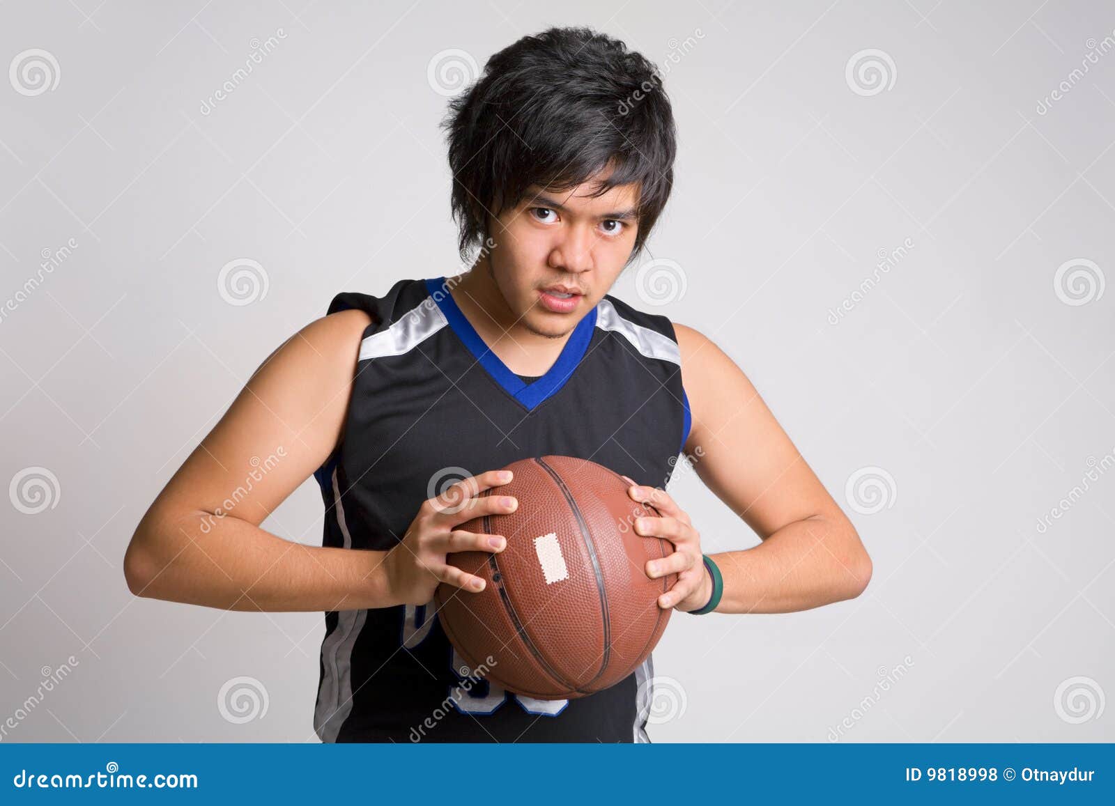 Basketball Player Holding Ball Stock Photo Image of background, white