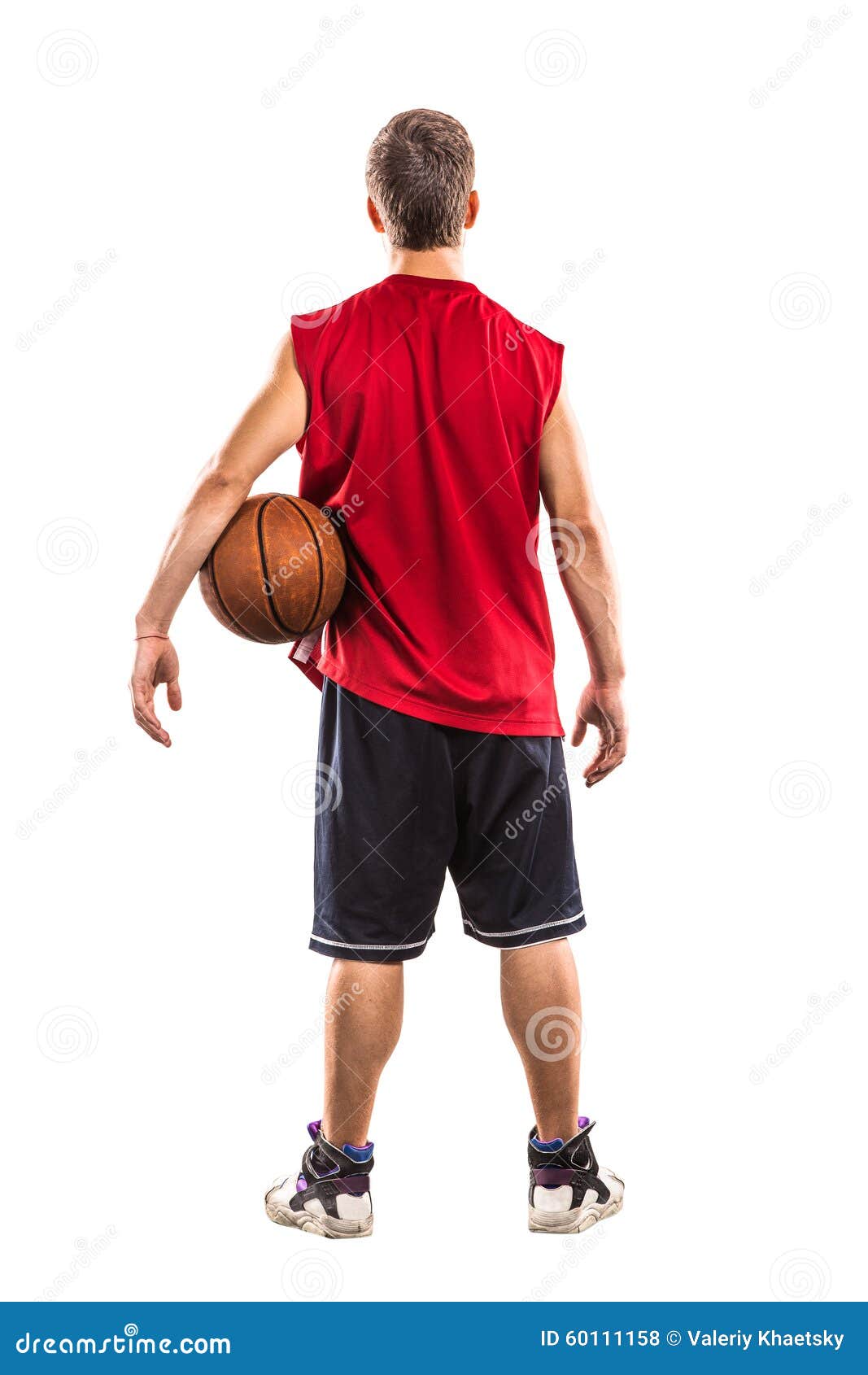 Basketball Player Standing with Ball from the Back Stock Photo Image