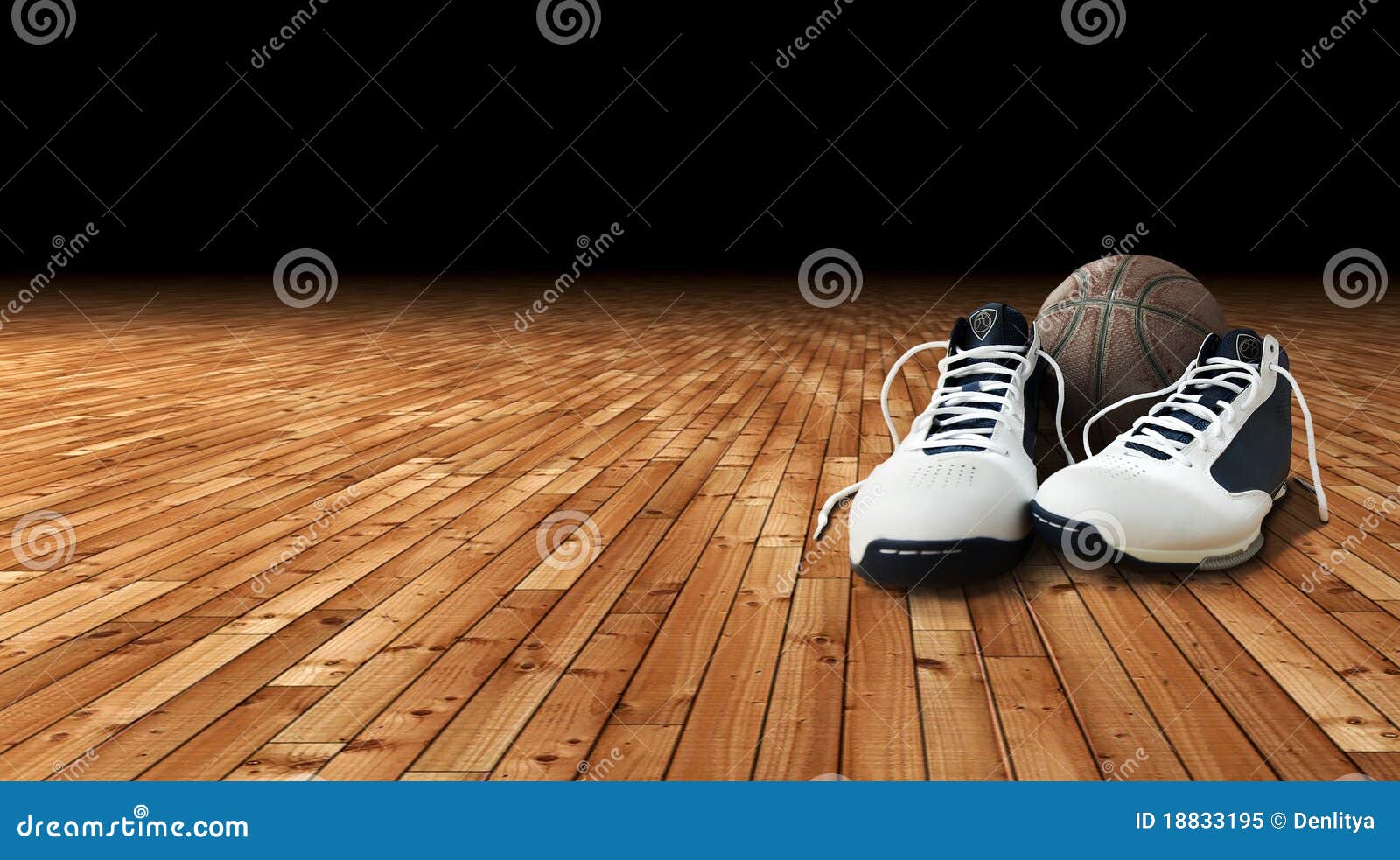 basketball shoes and ball on the court