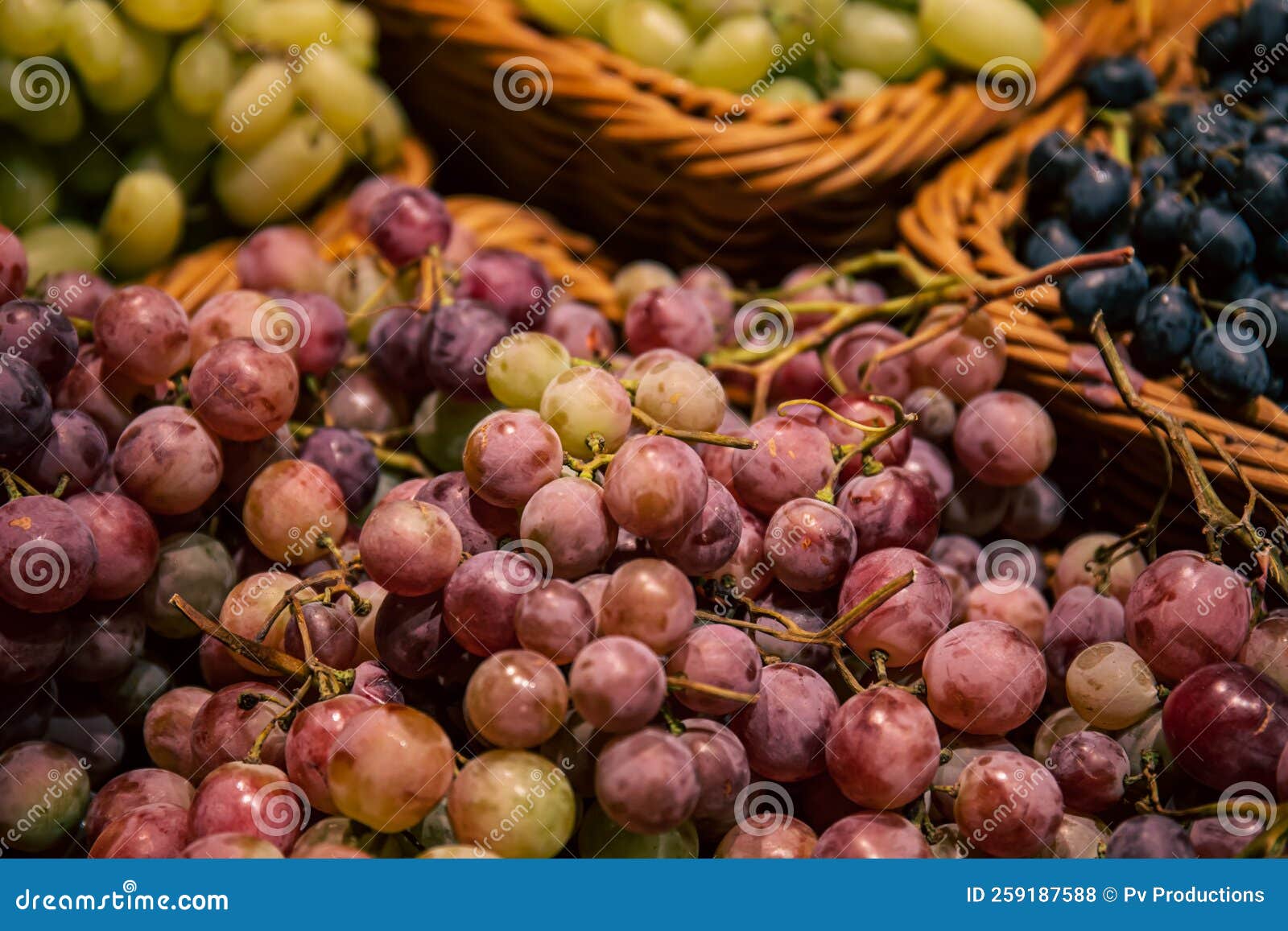 Baskets with Different Types of Grapes on a Supermarket Showcase. Stock ...