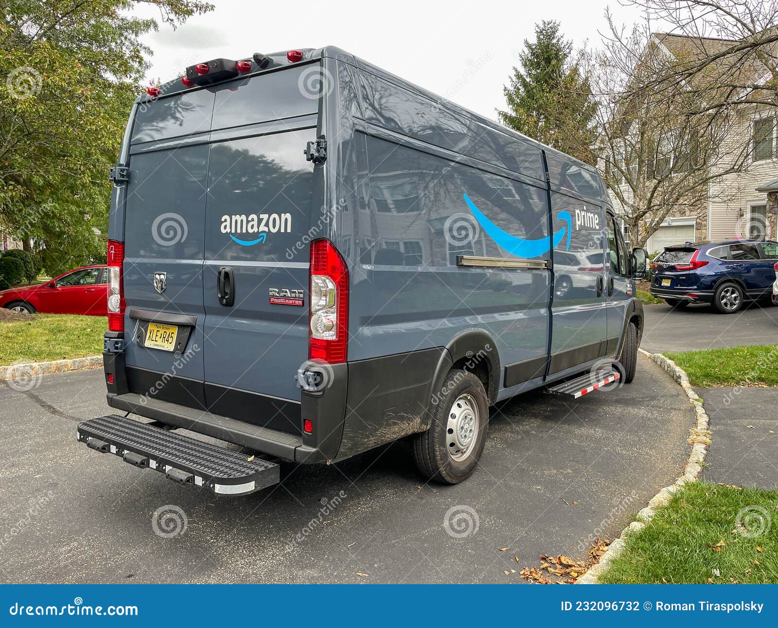 Amazon Prime home delivery editorial photography. Image of parked