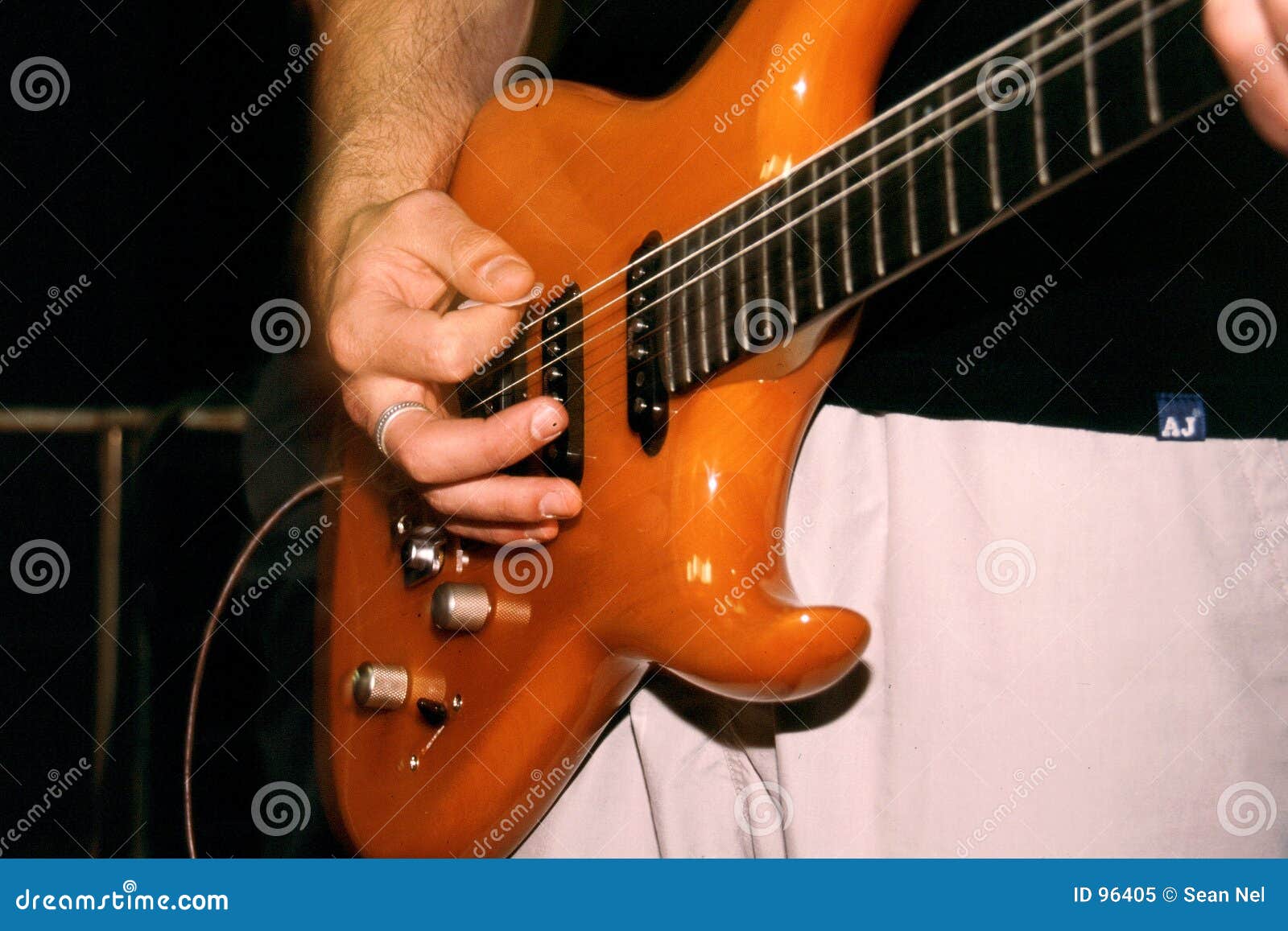 Bass Guitar stock image. Image of pick, guitar, bass, player 96405