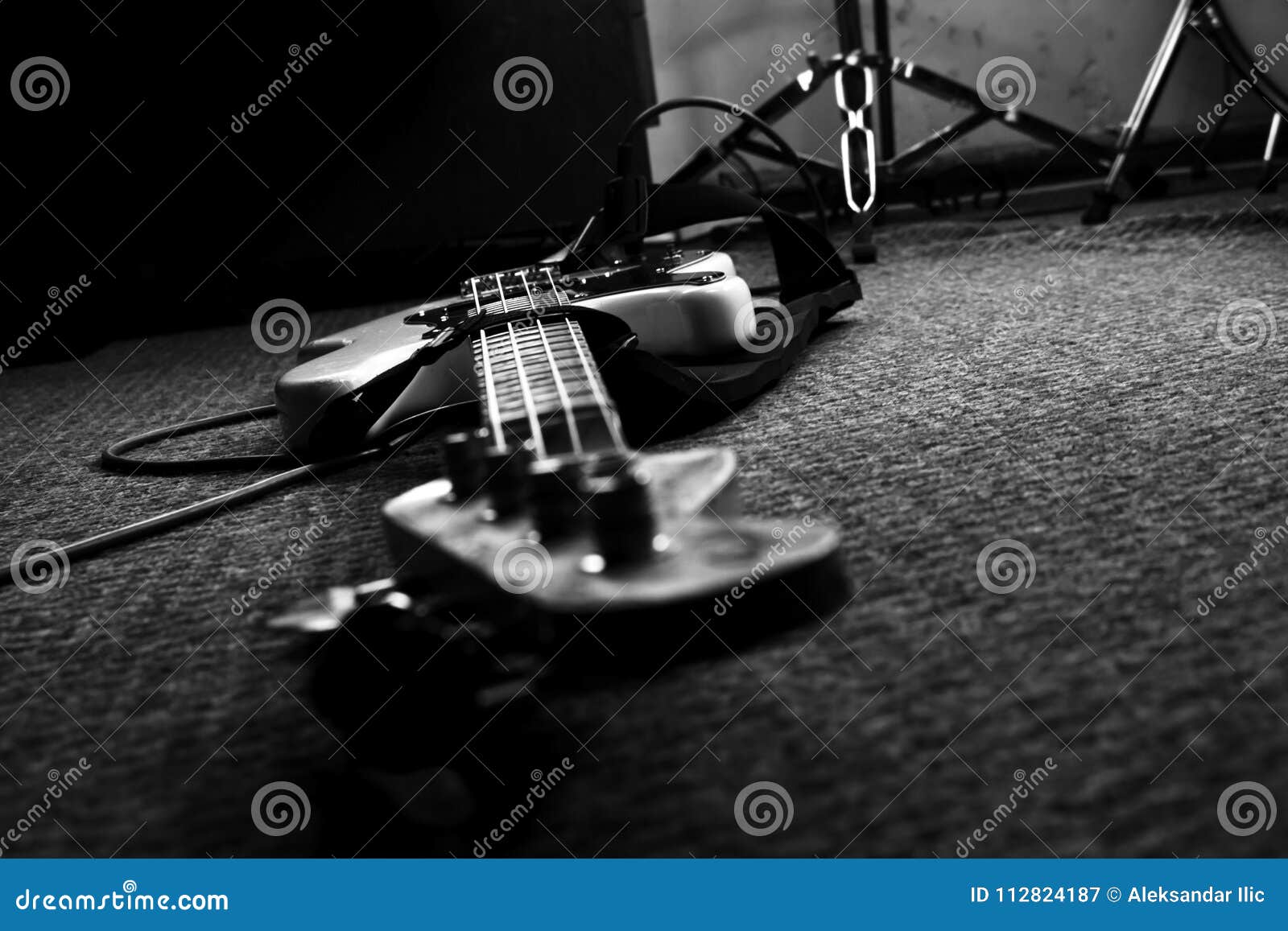 Bass Guitar in Music Studio. Musical Instruments and Equipment Stock