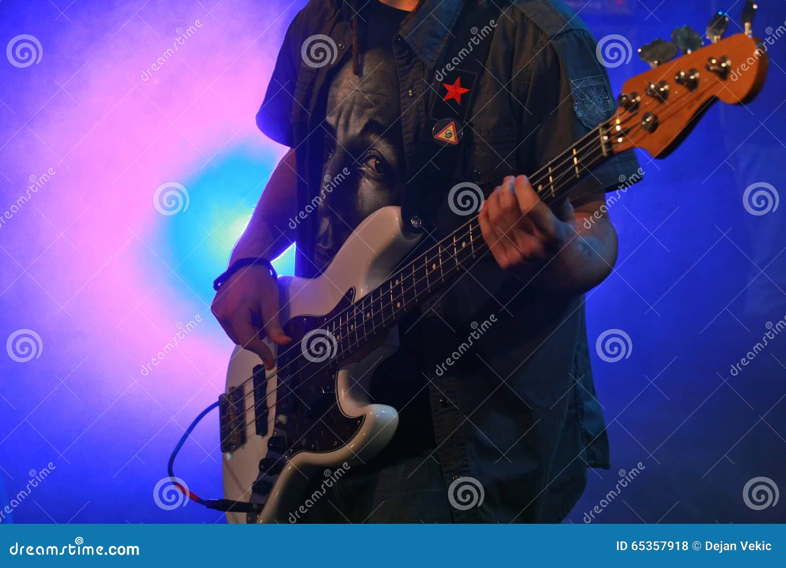 Bass guitar player editorial stock photo. Image of live 65357918