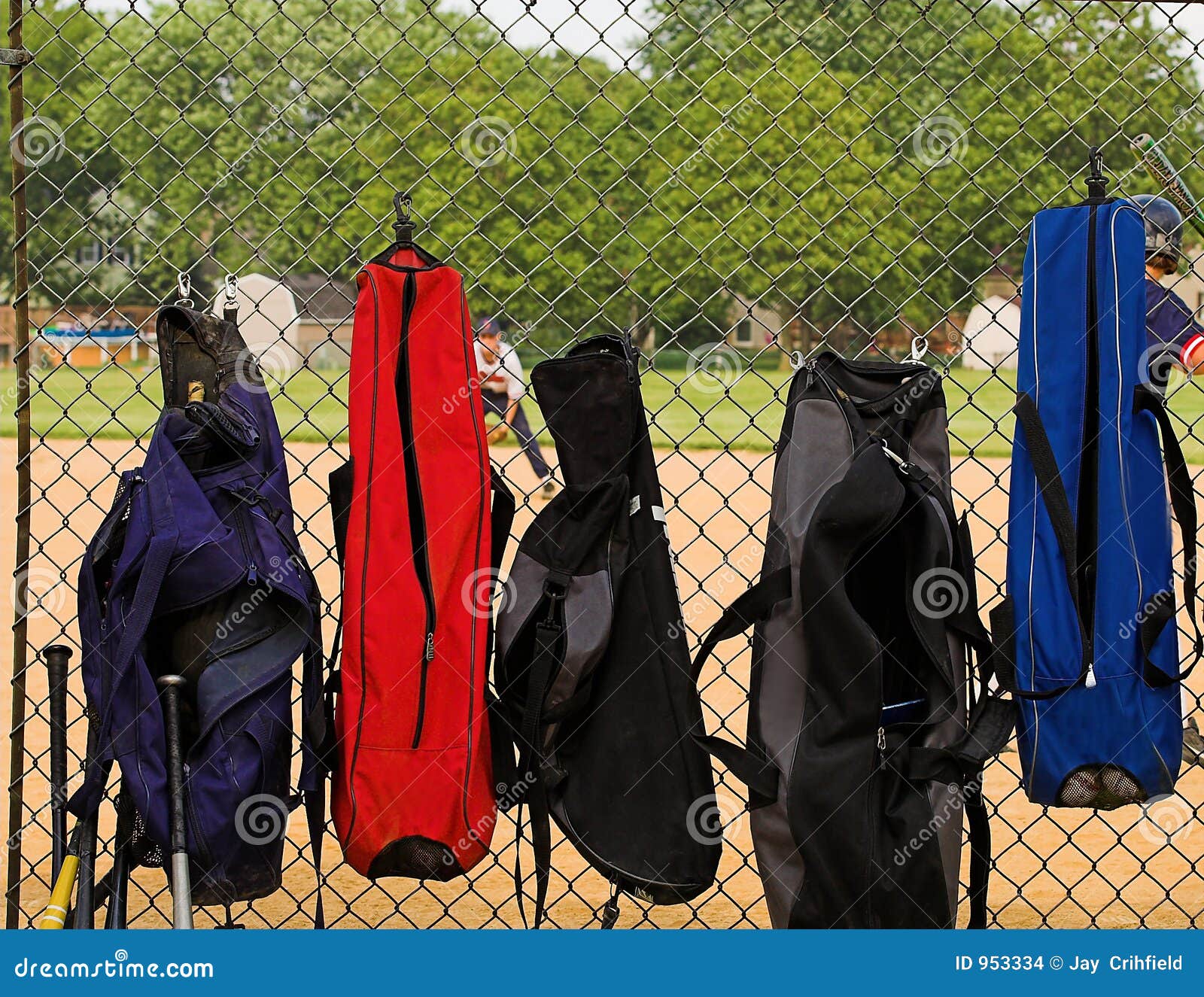 Bat bags on fence stock photo. Image of equipment, fence 953334