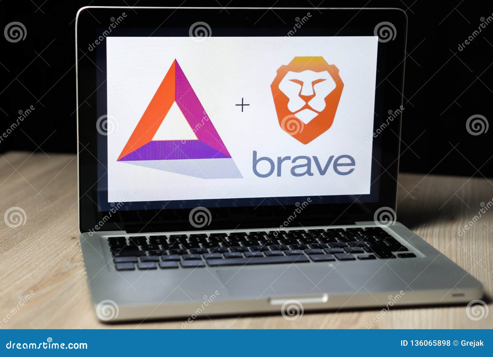 BAT Cryptocurrency And Brave Browser Logo On A Laptop ...