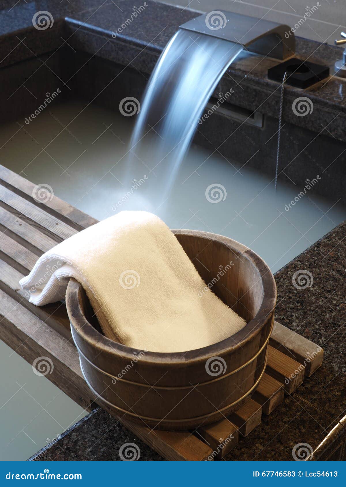 Bath bucket with a towel stock image. Image of water 67746583