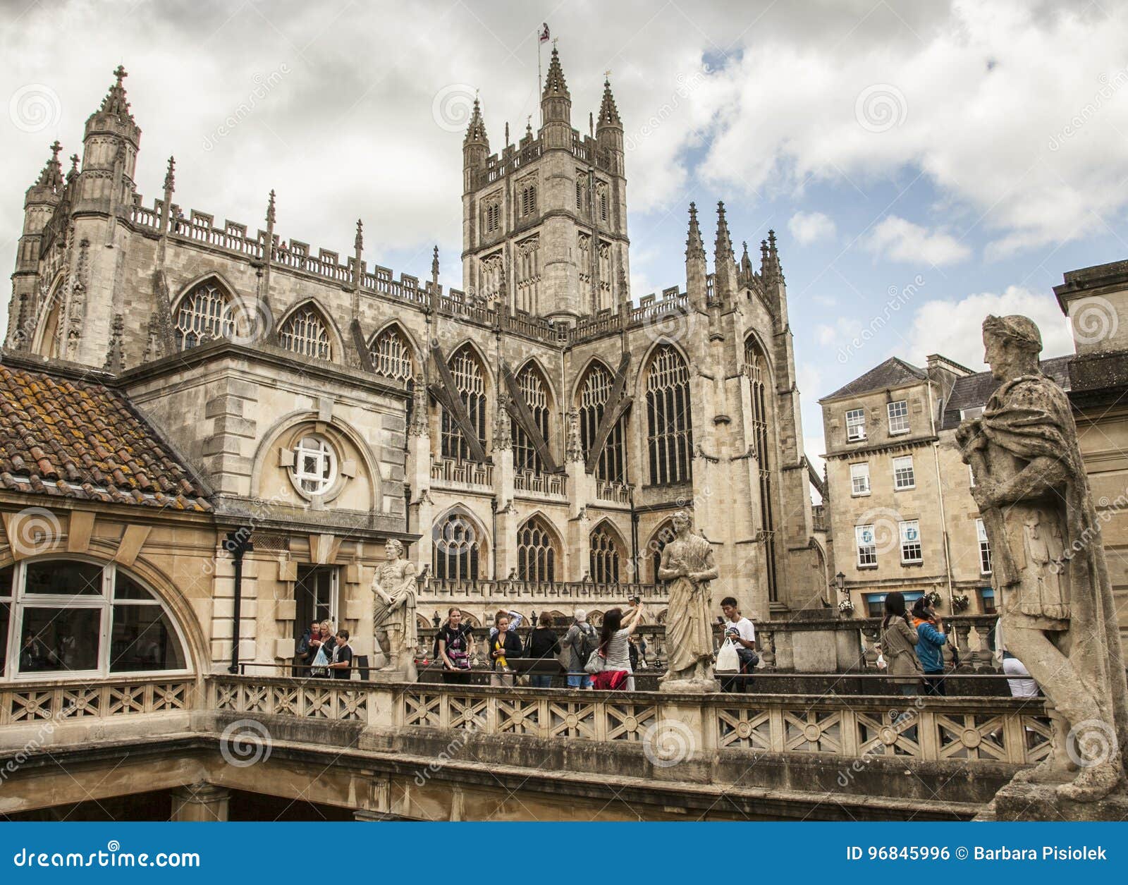 Bath, England the Cathedral and the Roman Baths. Editorial Photo