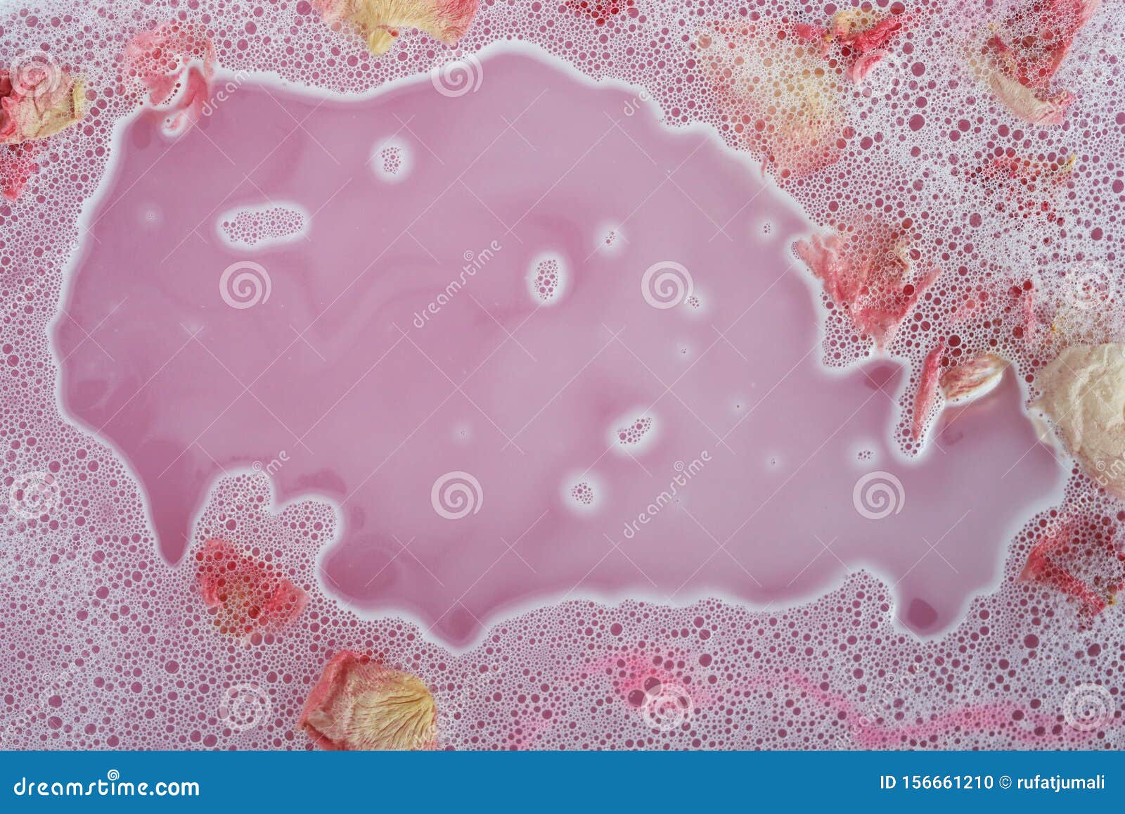 Bath with flower petals stock photo. Image of hygiene 156661210