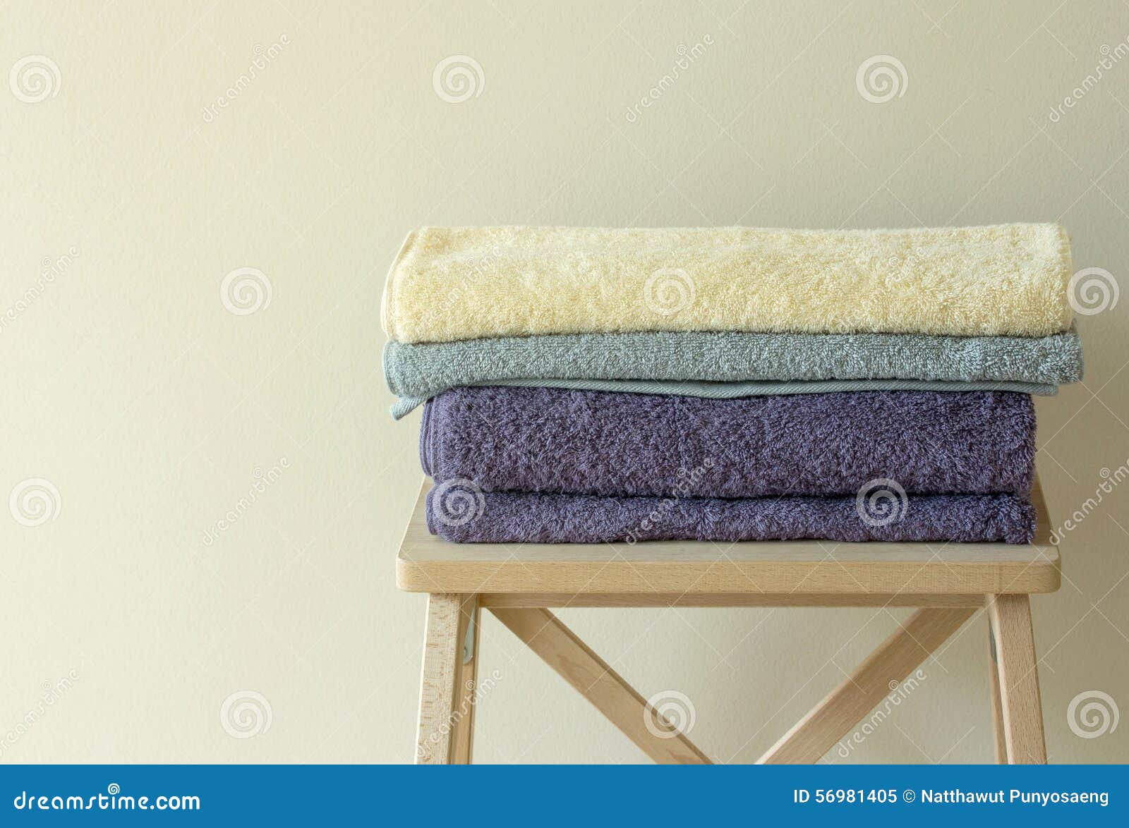 Bath towel on table stock image. Image of absorb, interior 56981405