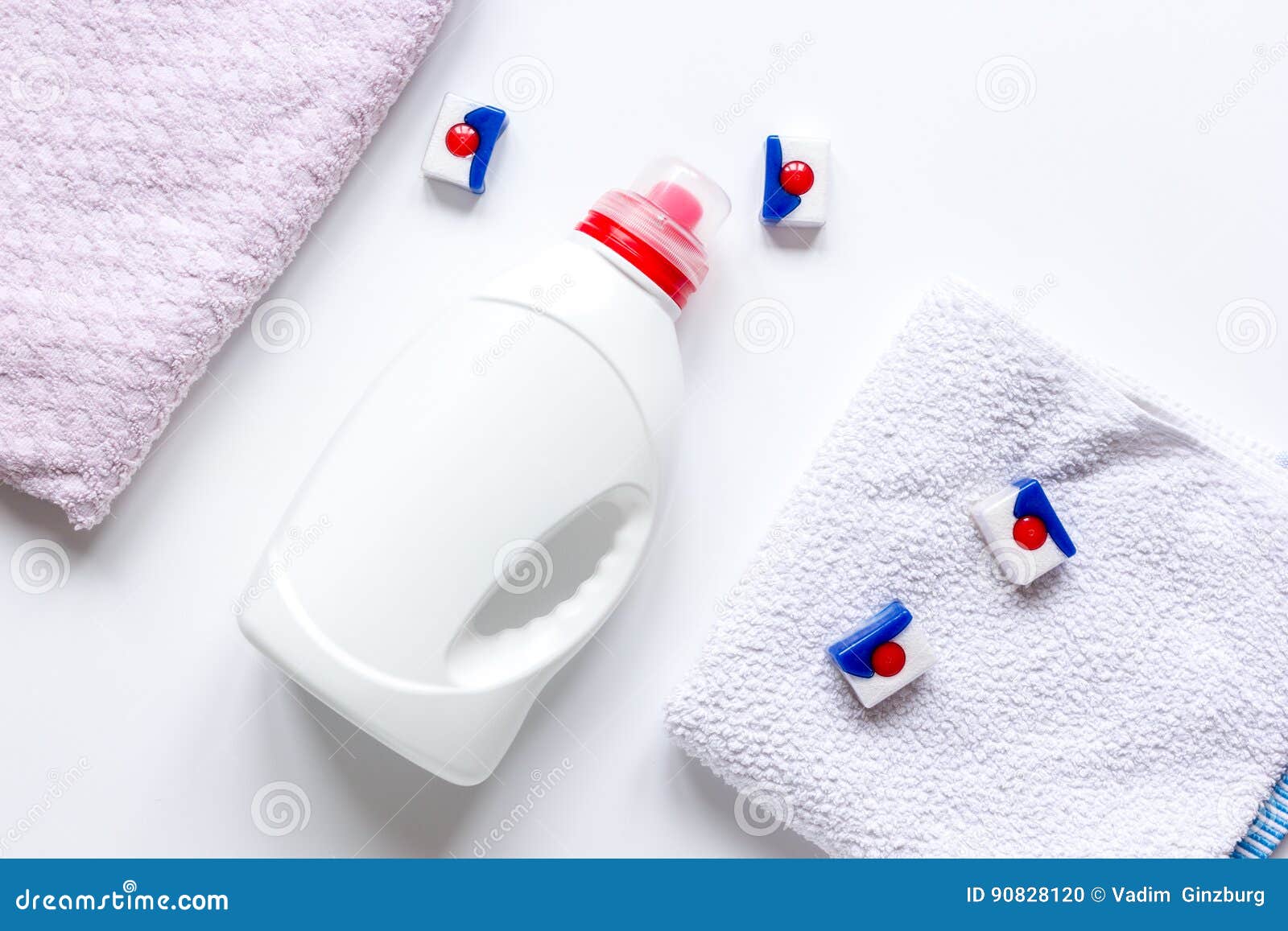 Bath Towels Stack with Detergent Bottle in Laundry Light Background Top
