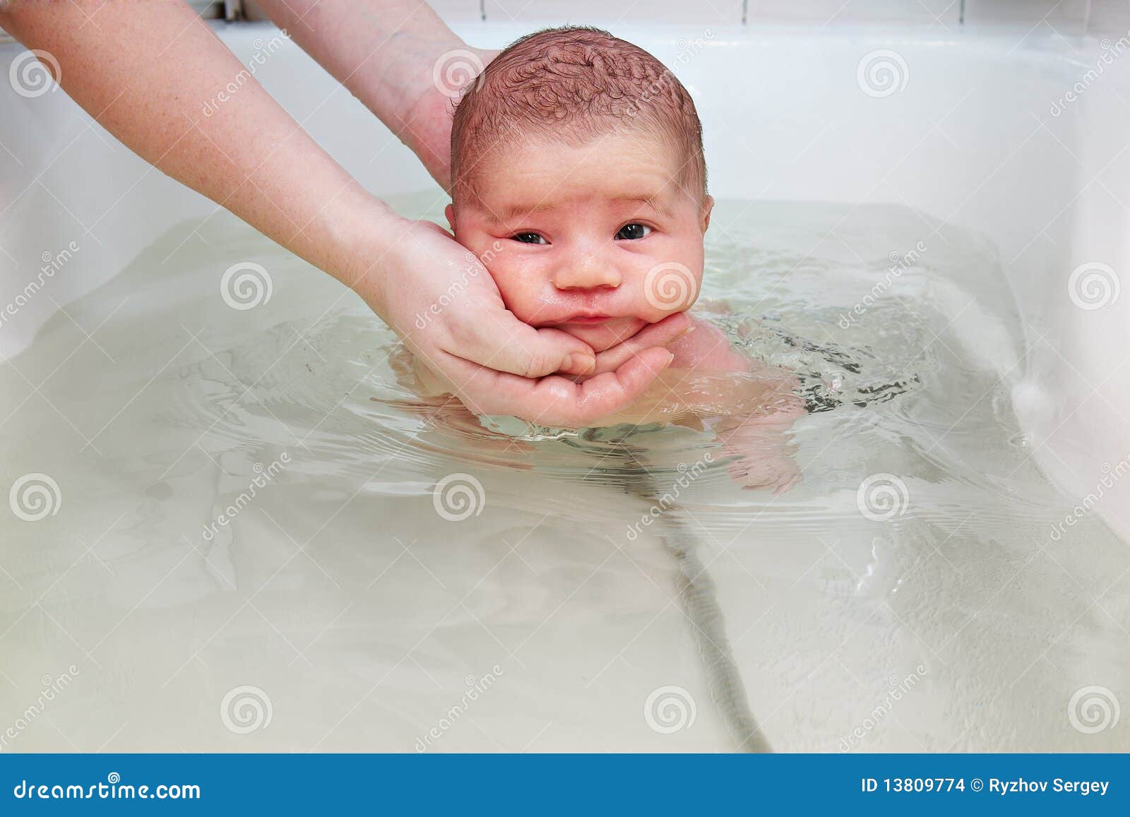 Bathing a baby stock photo. Image of skin, therapy, tempering 13809774