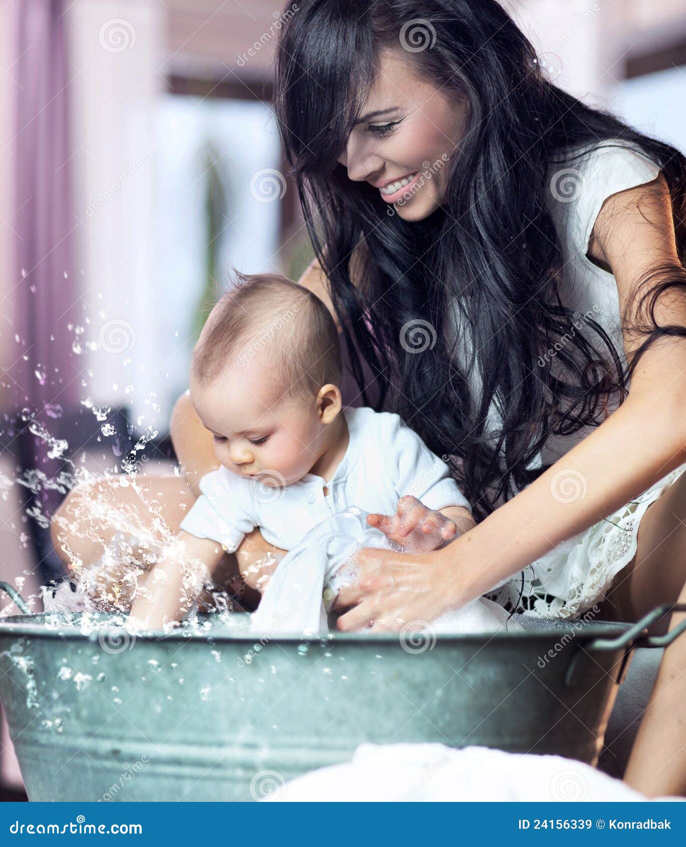 Bathing baby stock image. Image of help, care, home, family 24156339