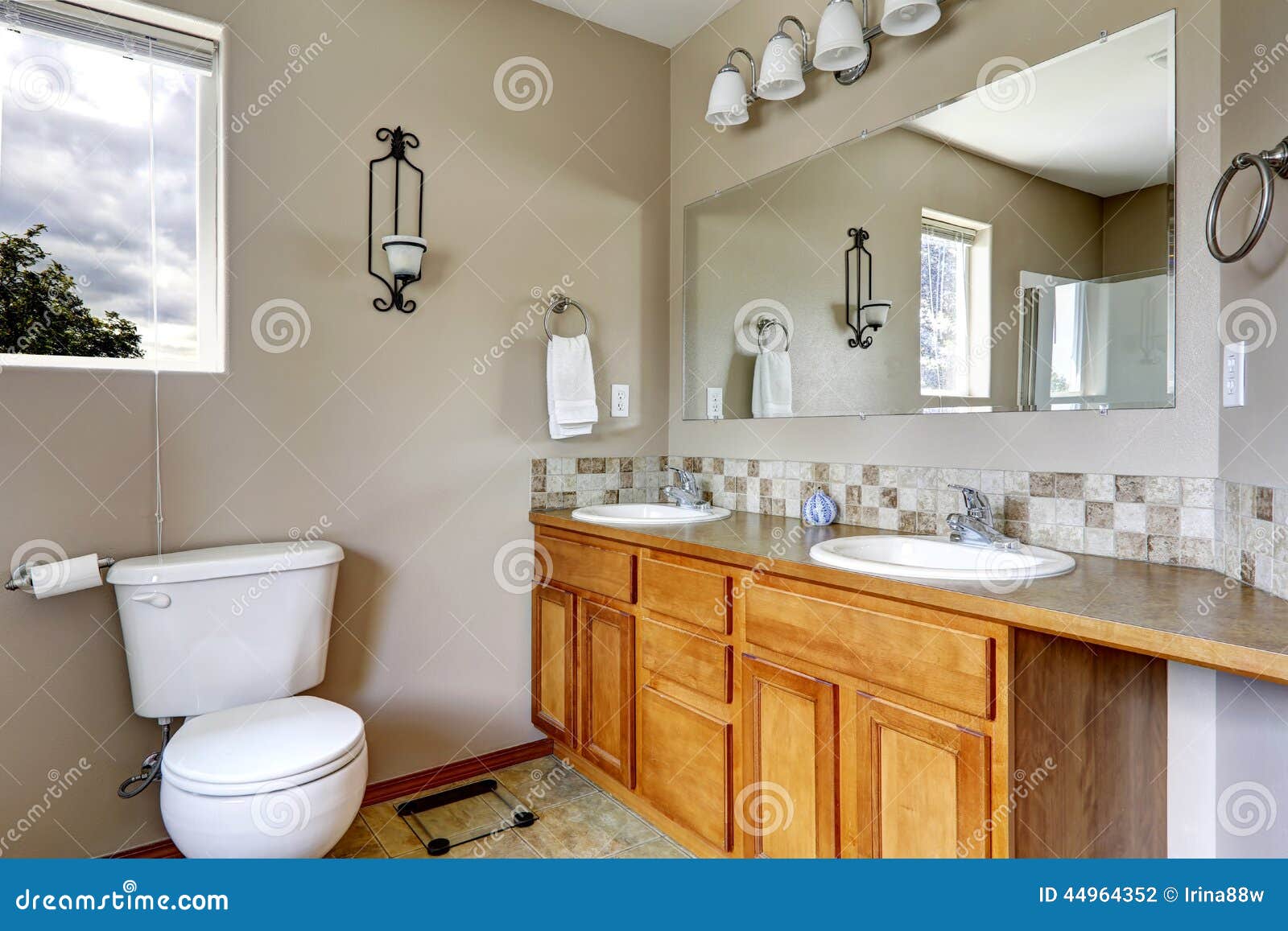Bathroom with Two Sinks and Tile Trim Stock Photo Image of