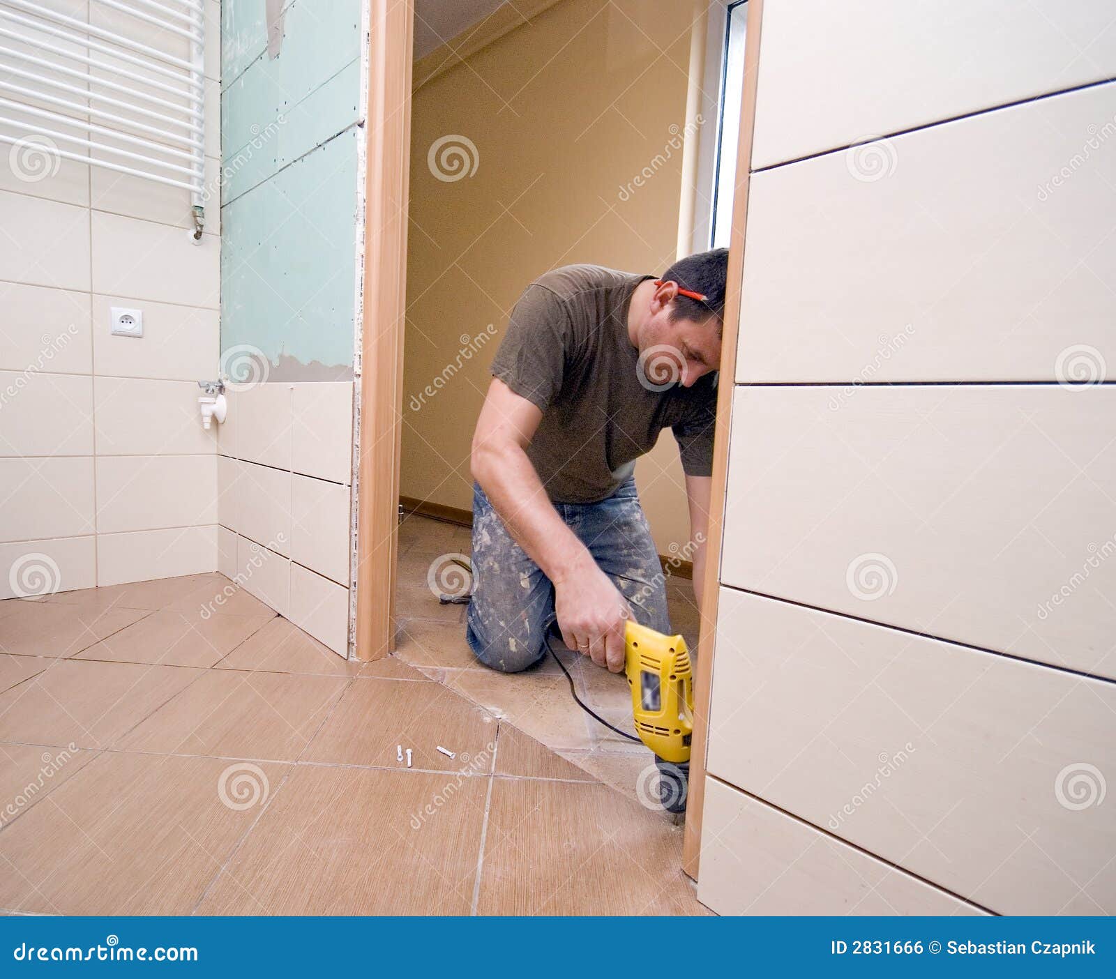 Bathroom door renovation stock photo. Image of kneeling 2831666