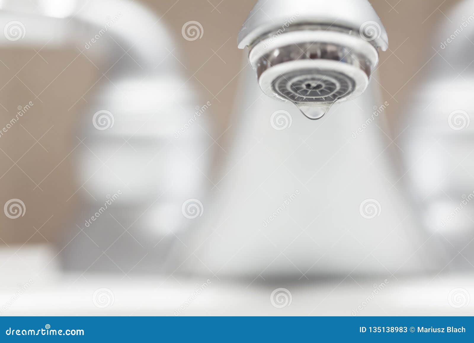 bathroom faucet dripping water