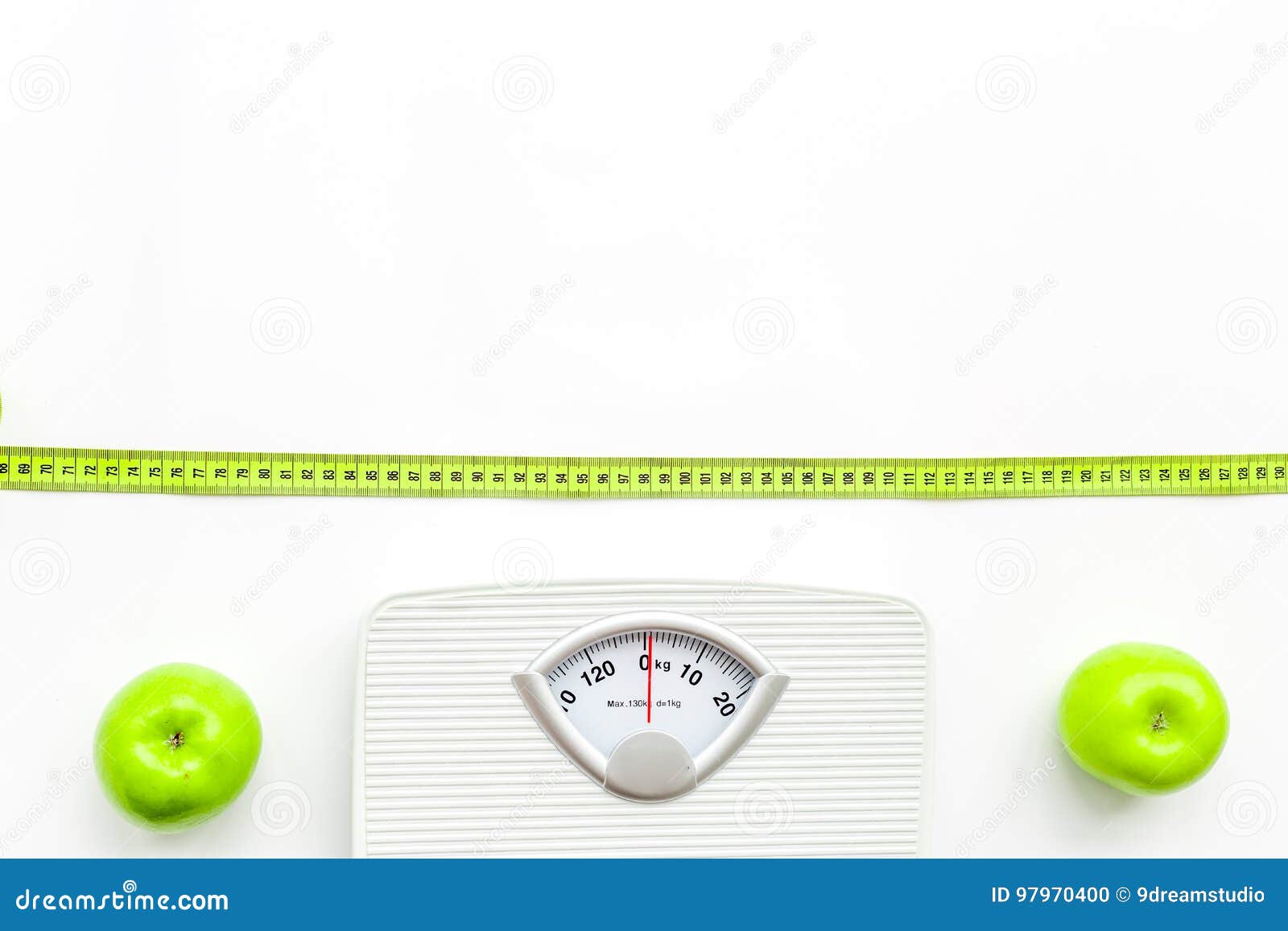 Bathroom Scale, Measuring Tape and Apples on White Background Top View