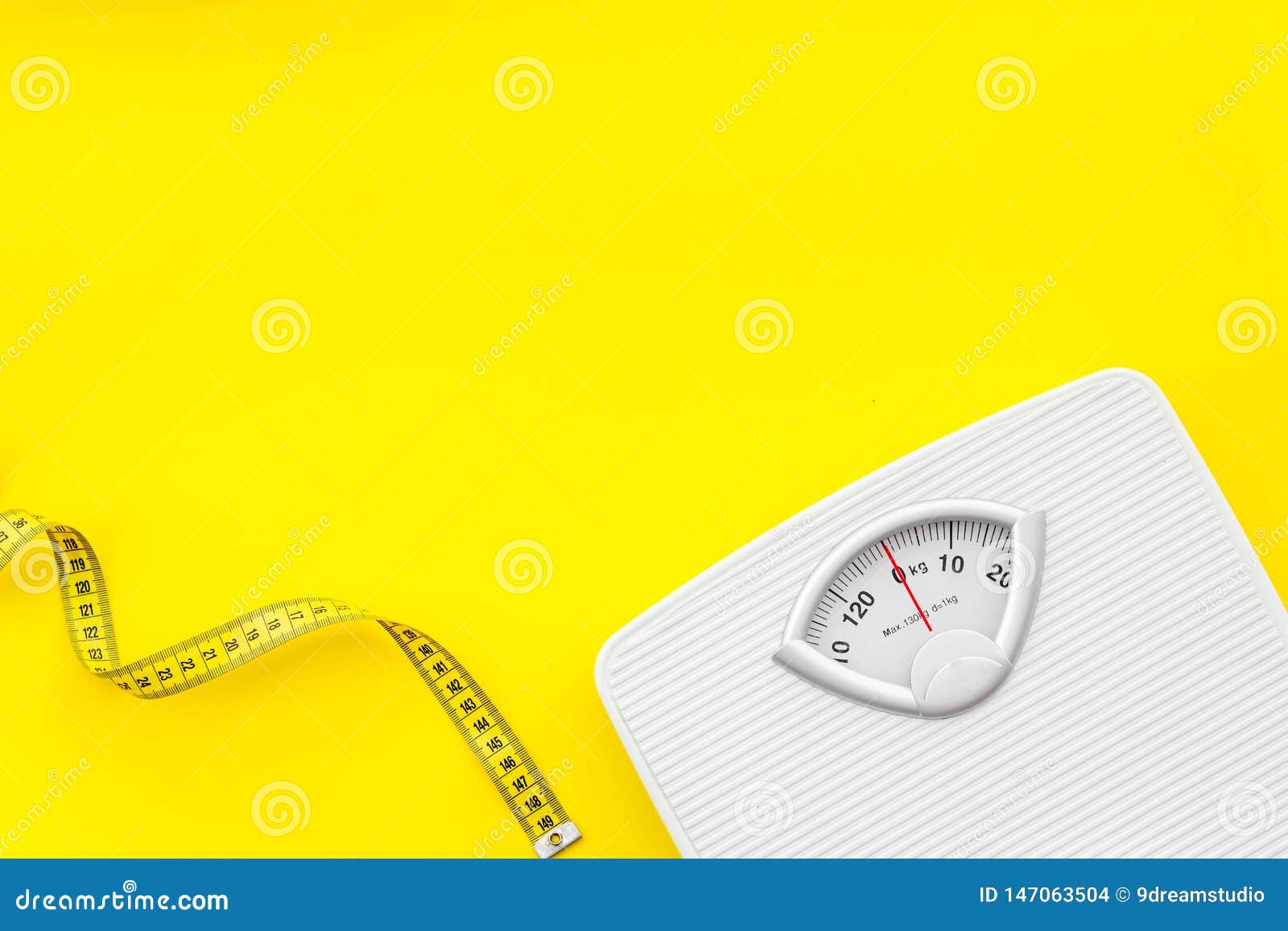 Download Bathroom Scales And Measuring Tape For Weight Loss Concept On Yellow Background Top View Mock Up ...