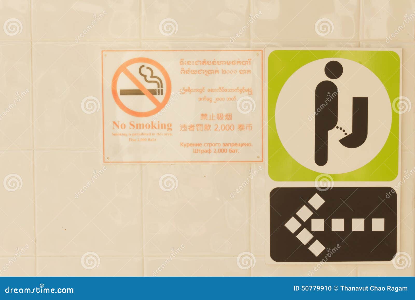 Bathroom With Signs For Males Females And People With Disabilities