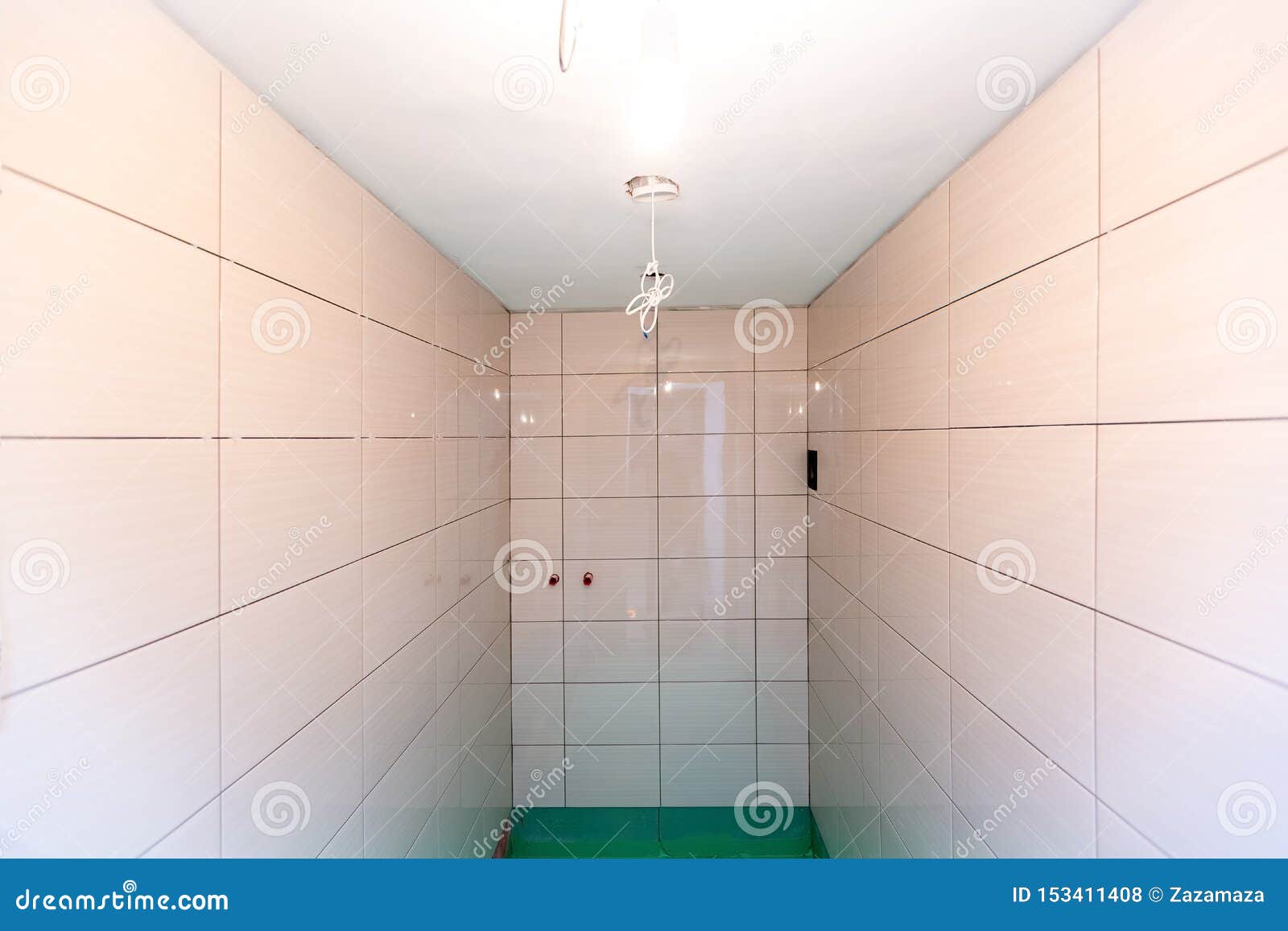 Bathroom With Tiled Walls And Floor Painted By Green Colored