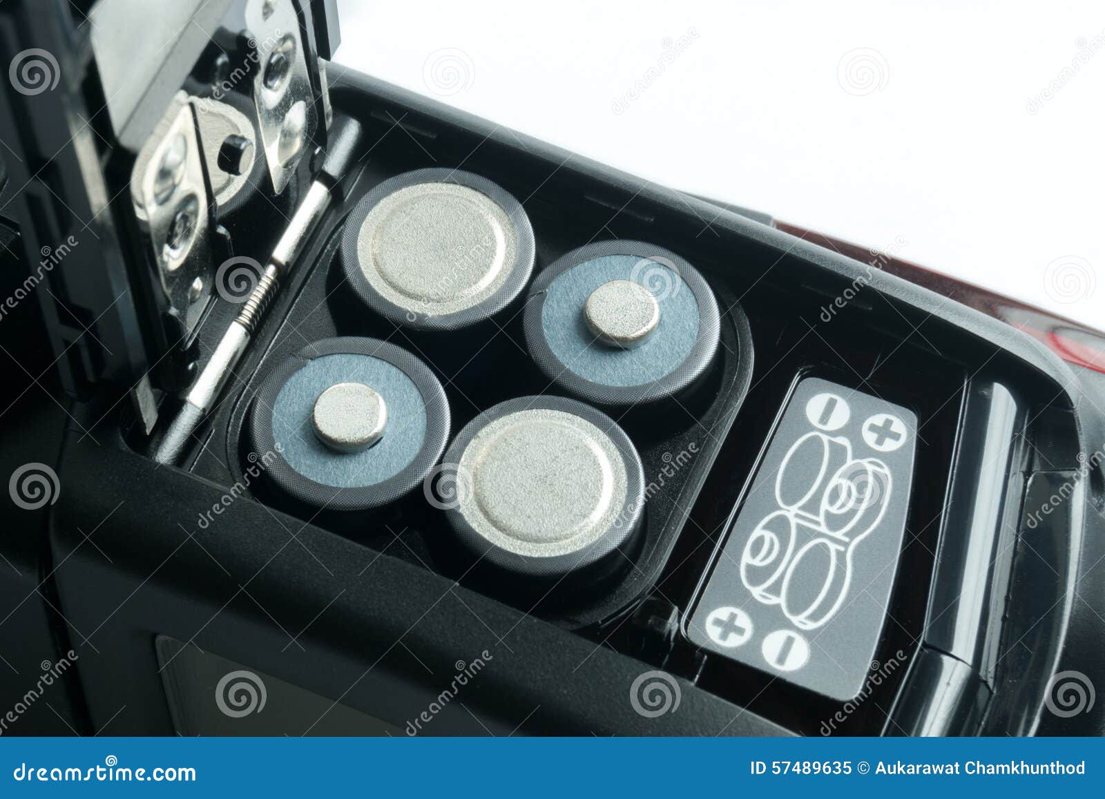 Batteries in flashlight stock image. Image of electrode 57489635