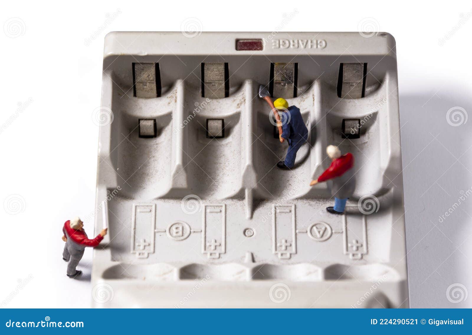Battery Charger Portable. Maintenance and Cleaning Contacts Stock Image