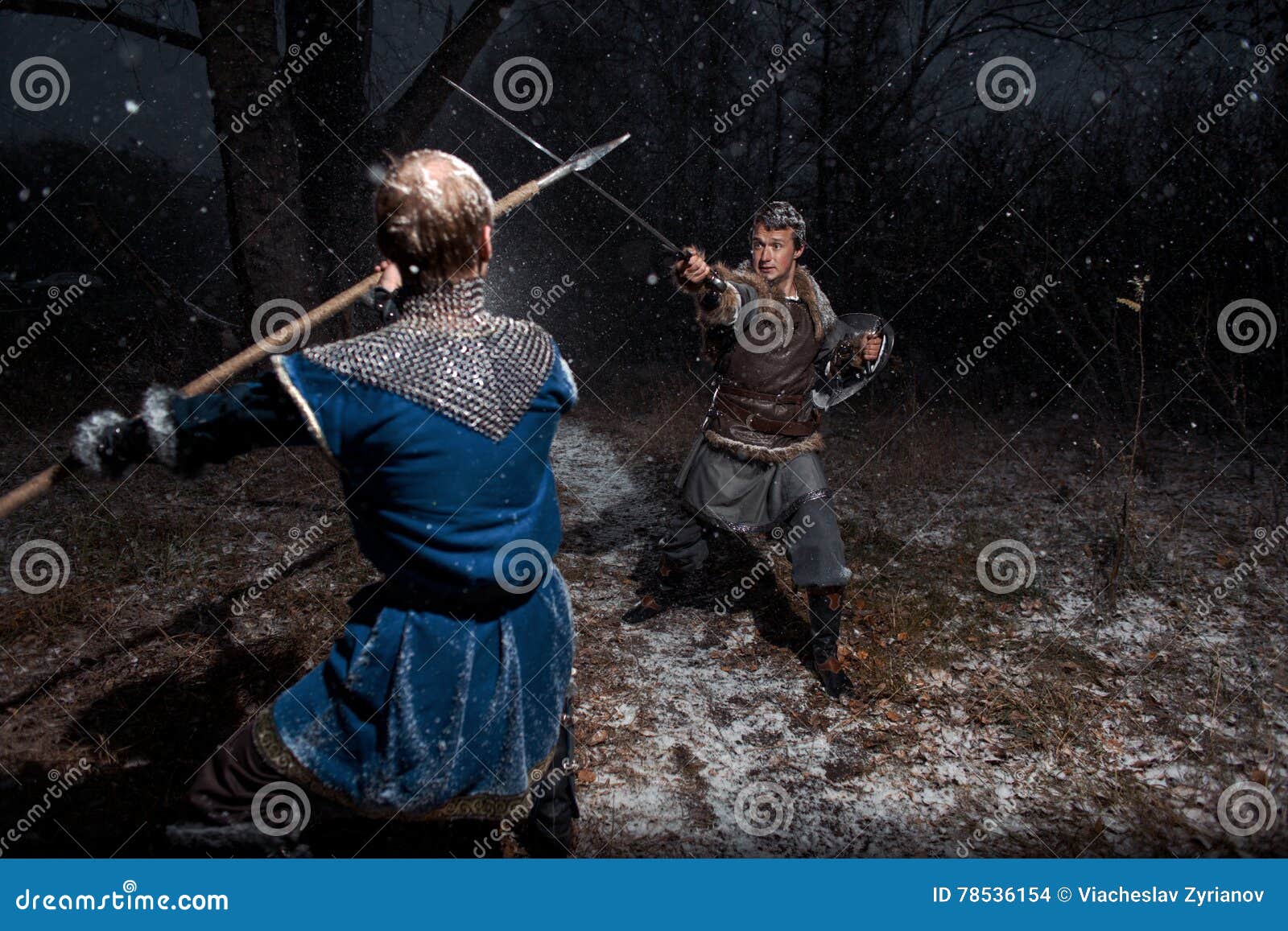 the battle between medieval knights in the style of game of thrones in winter forest landscapes. spear against sword