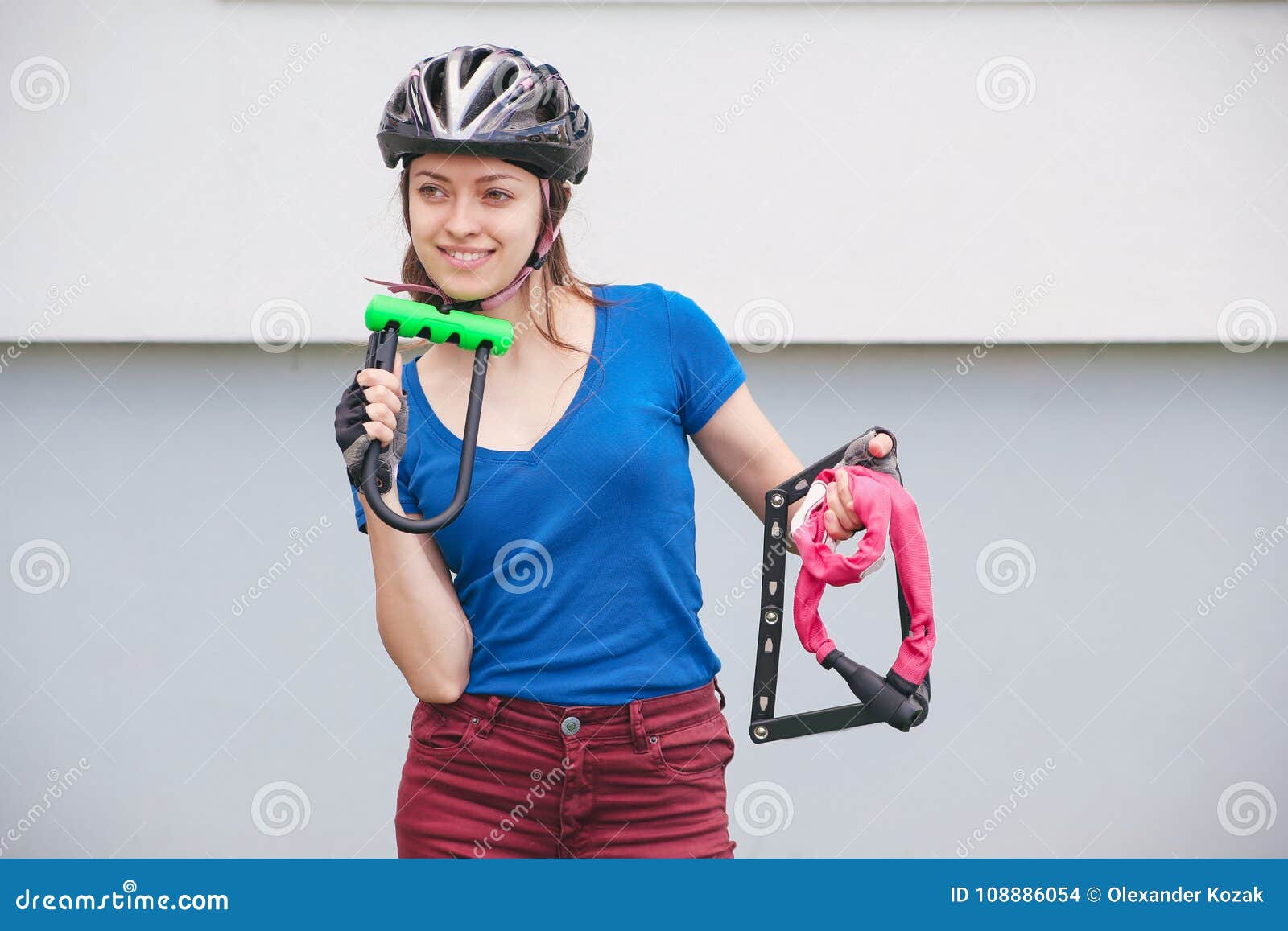 Bicycle Lock. Bicycle Locks in the Hands of the Girl. Cycling Park