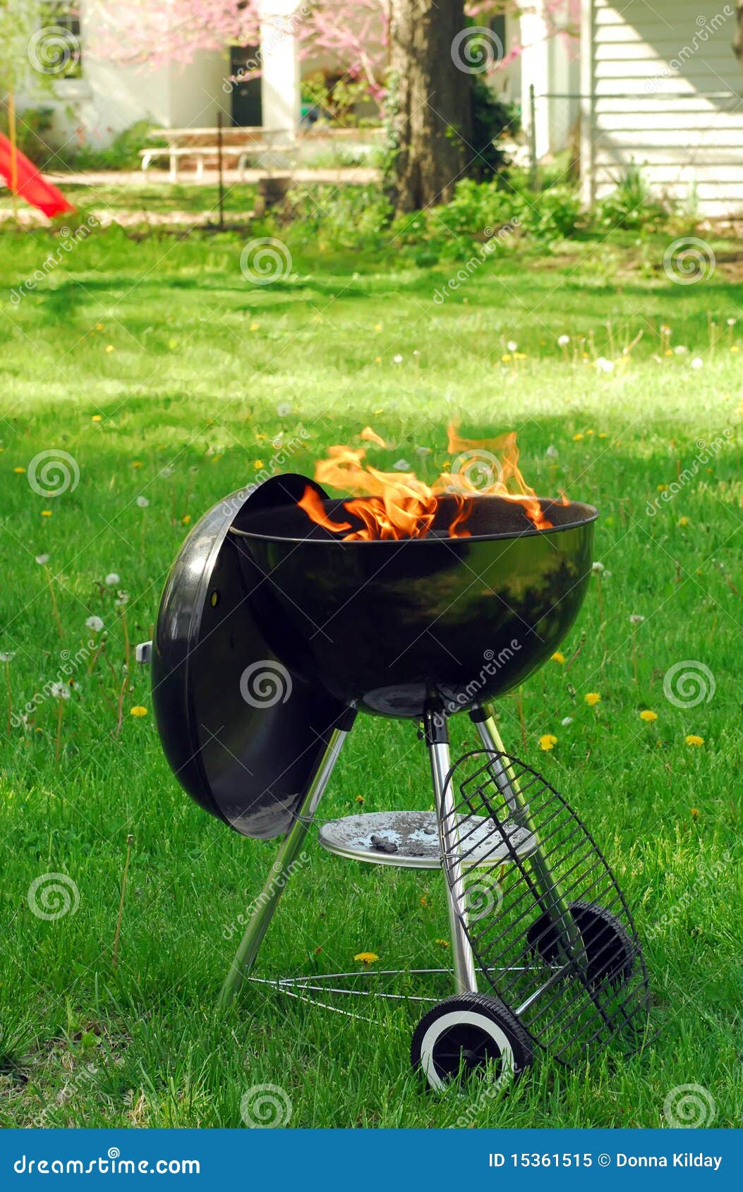 BBQ grill in backyard stock image. Image of flame, seasonal - 15361515