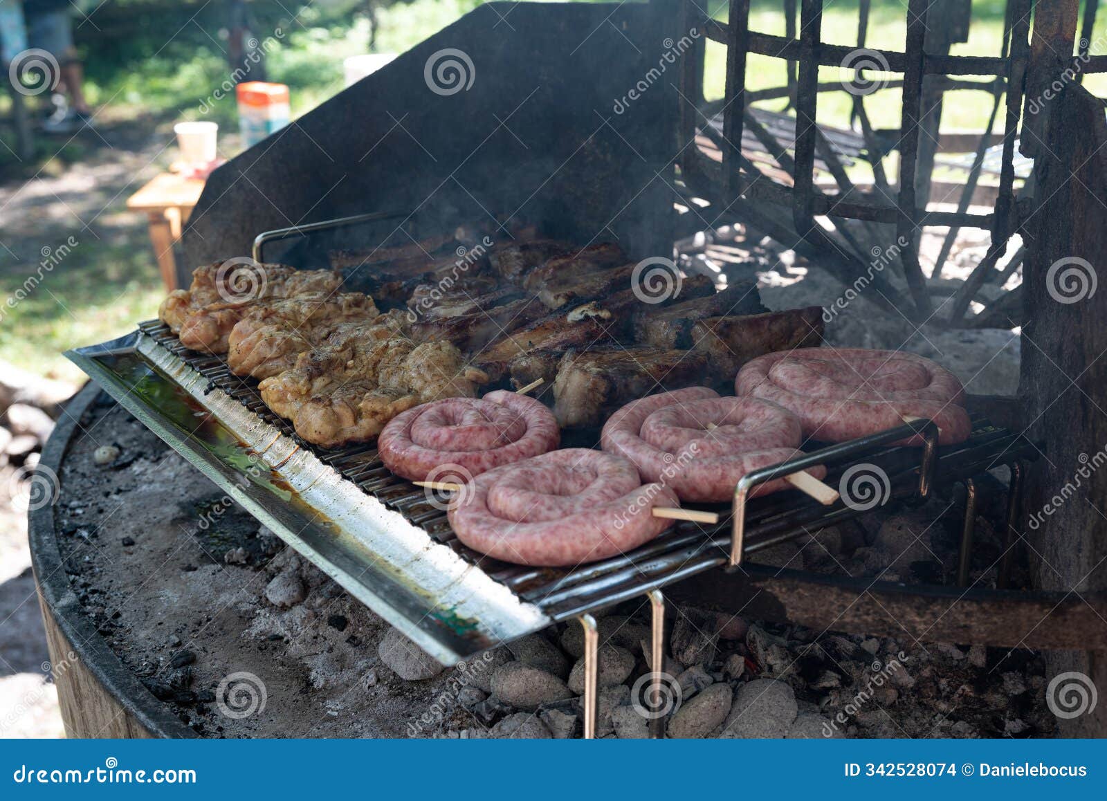 bbq with pork ribs, sausages and grilled chicken breasts