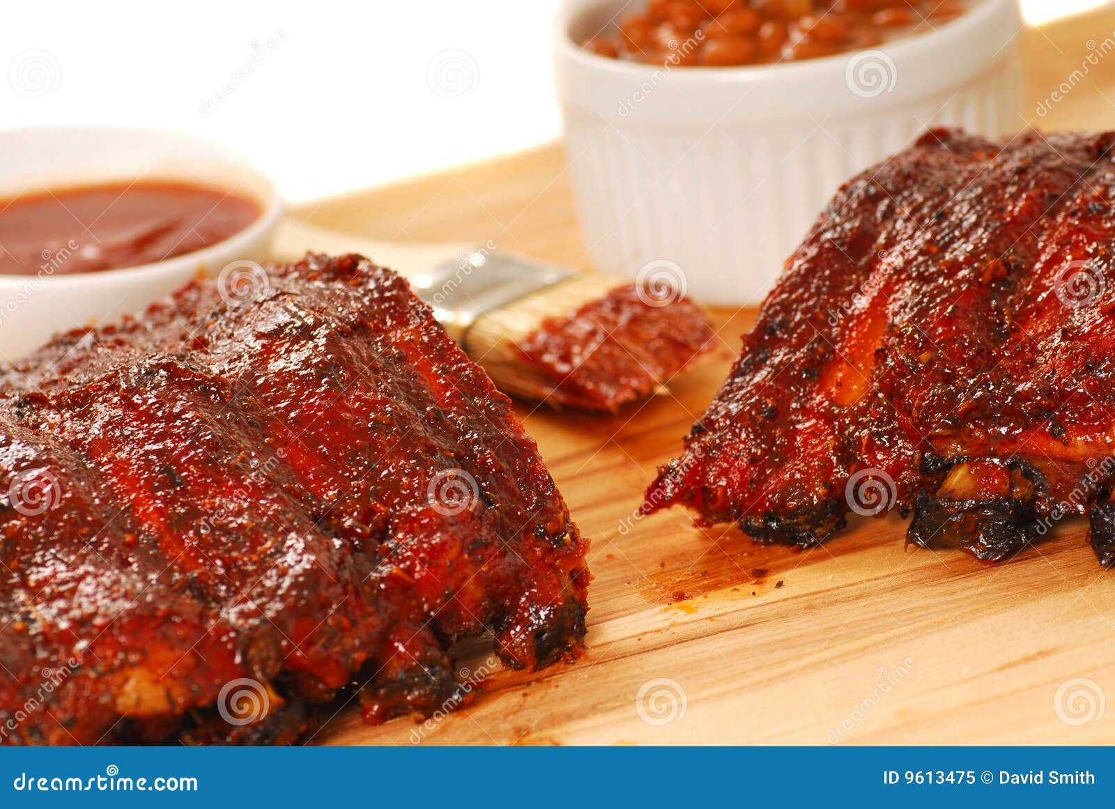 BBQ Ribs with Beans and Dipping Sauce Stock Image Image of barbecue