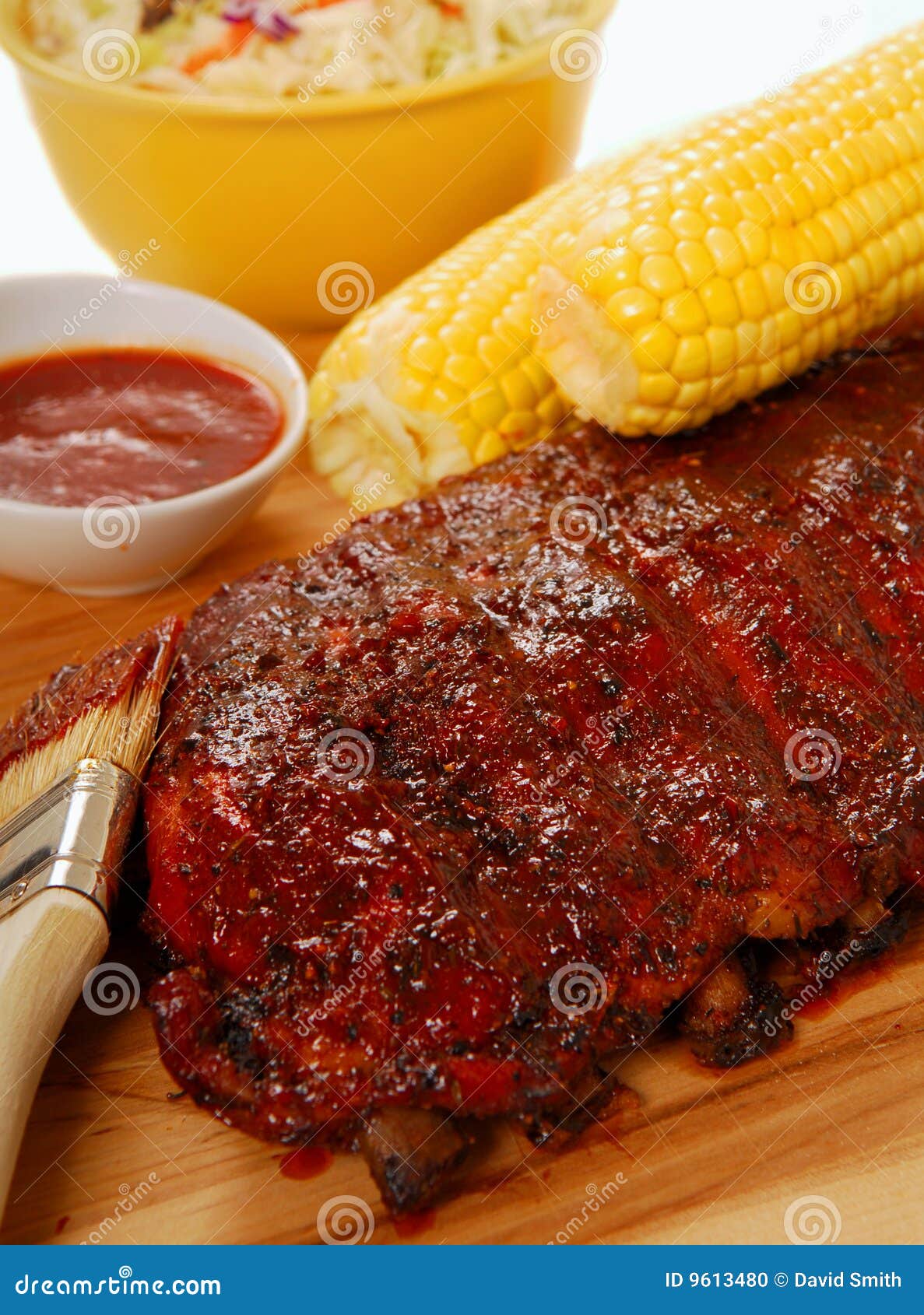 BBQ Ribs with Cole Slaw, Corn and Dipping Sauce Stock Photo Image of