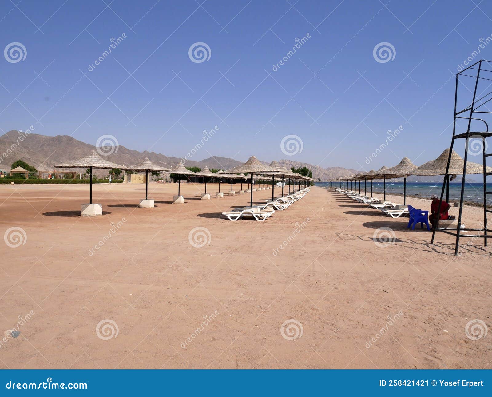 Beach with Awnings for Shade and Sun Loungers Stock Image - Image of ...