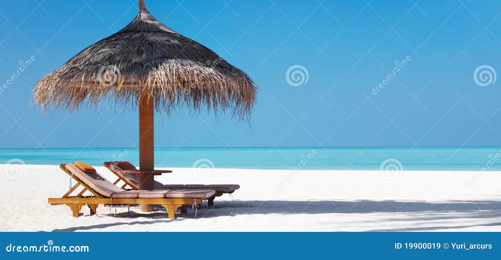 Beach beautifu chairs umbrella. Attractive beach chairs umbrella view