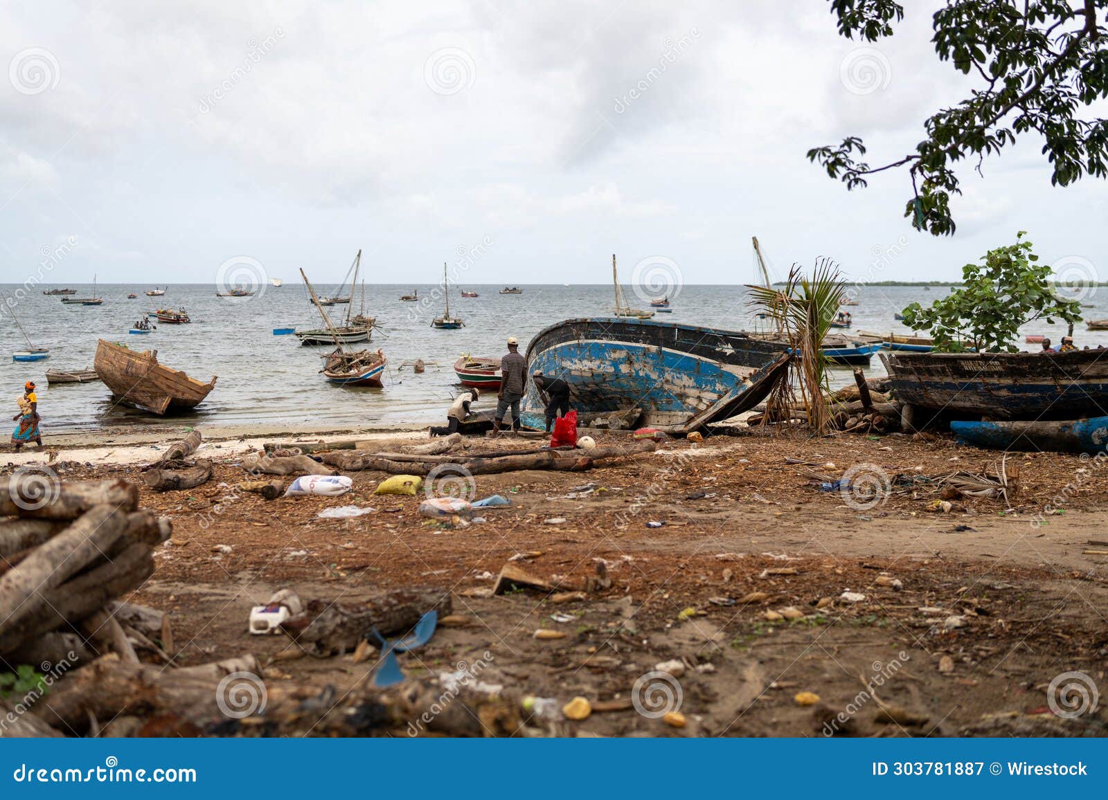beach with boats in mocimboa da praia in cabo delgado province, mozambique