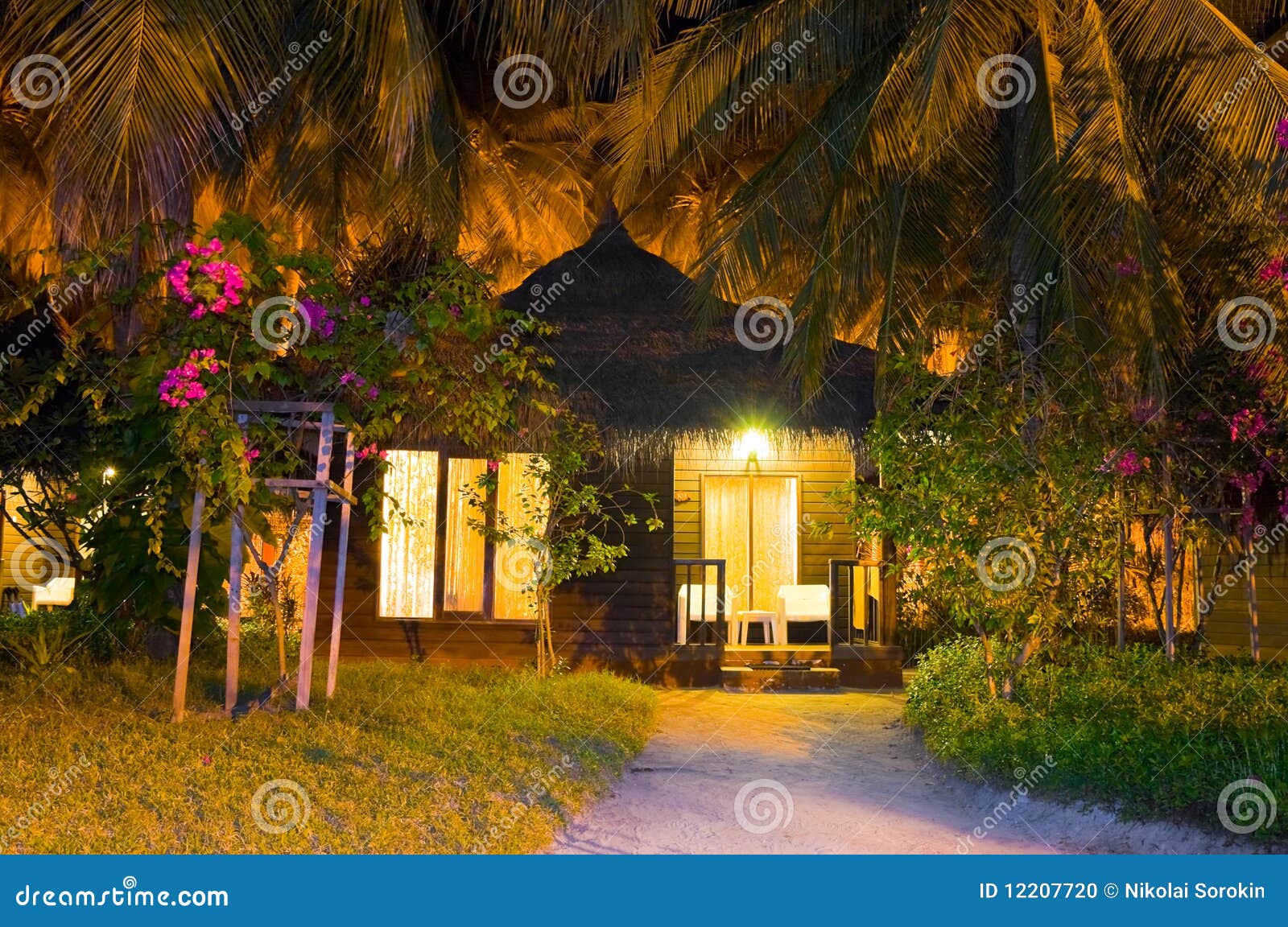 Beach bungalow at night stock photo. Image of house, beauty 12207720